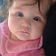 Ambre participe au concours pour gagner de l'argent avec cette photo : adorable, baby, cheeks, child, close_up, curly_hair, cute, eyelashes, eyes, face, fluffy_cheeks, holding, indoor, infant, looking_at_camera, onesie, person, pink_clothing, portrait, soft_texture