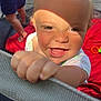 Louis is registered to the contest to win money with this photo: toddler, child, baby, smiling, outdoor, sunlight, shadow, hand, face, clothing, blanket, toy, play, happy, person, summer, daylight, curly_hair, cute, fence