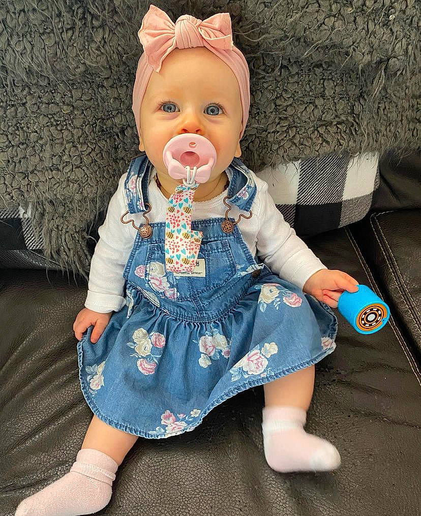 Everlyn joined the competition — help win amazing prizes! art, baby, baby_toddler_clothing, cheek, child, doll, eye, eyelash, fashion_accessory, head, iris, pattern, person, pink, sitting, skin, sleeve, textile, toy, wig