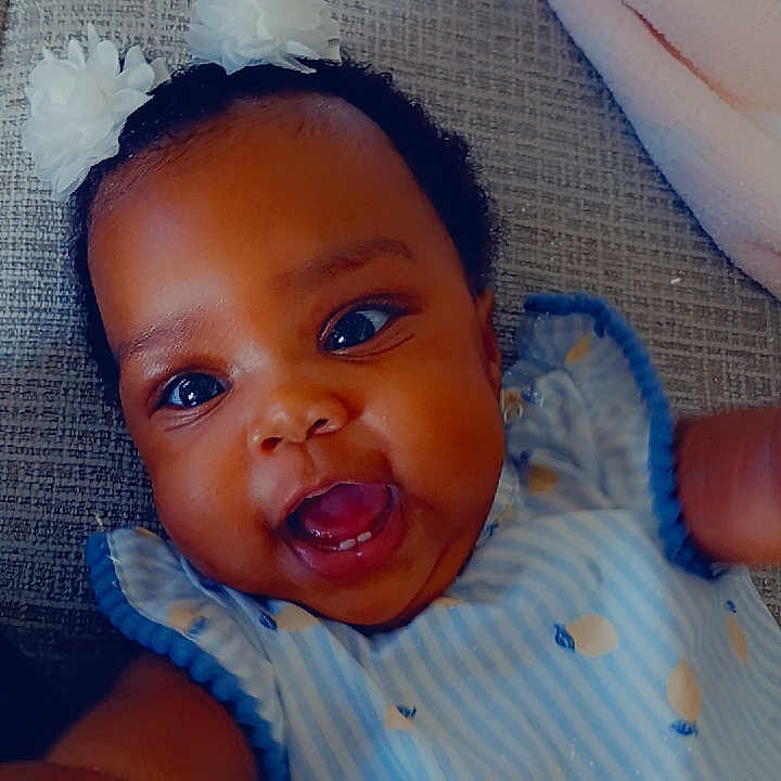 Kenyeri is registered to the contest to win money with this photo: baby, babylaughing, bodypart, clothing, couch, cushion, face, finger, furniture, hand, happy, head, homedecor, laughing, mouth, newborn, person, photography, portrait, smile