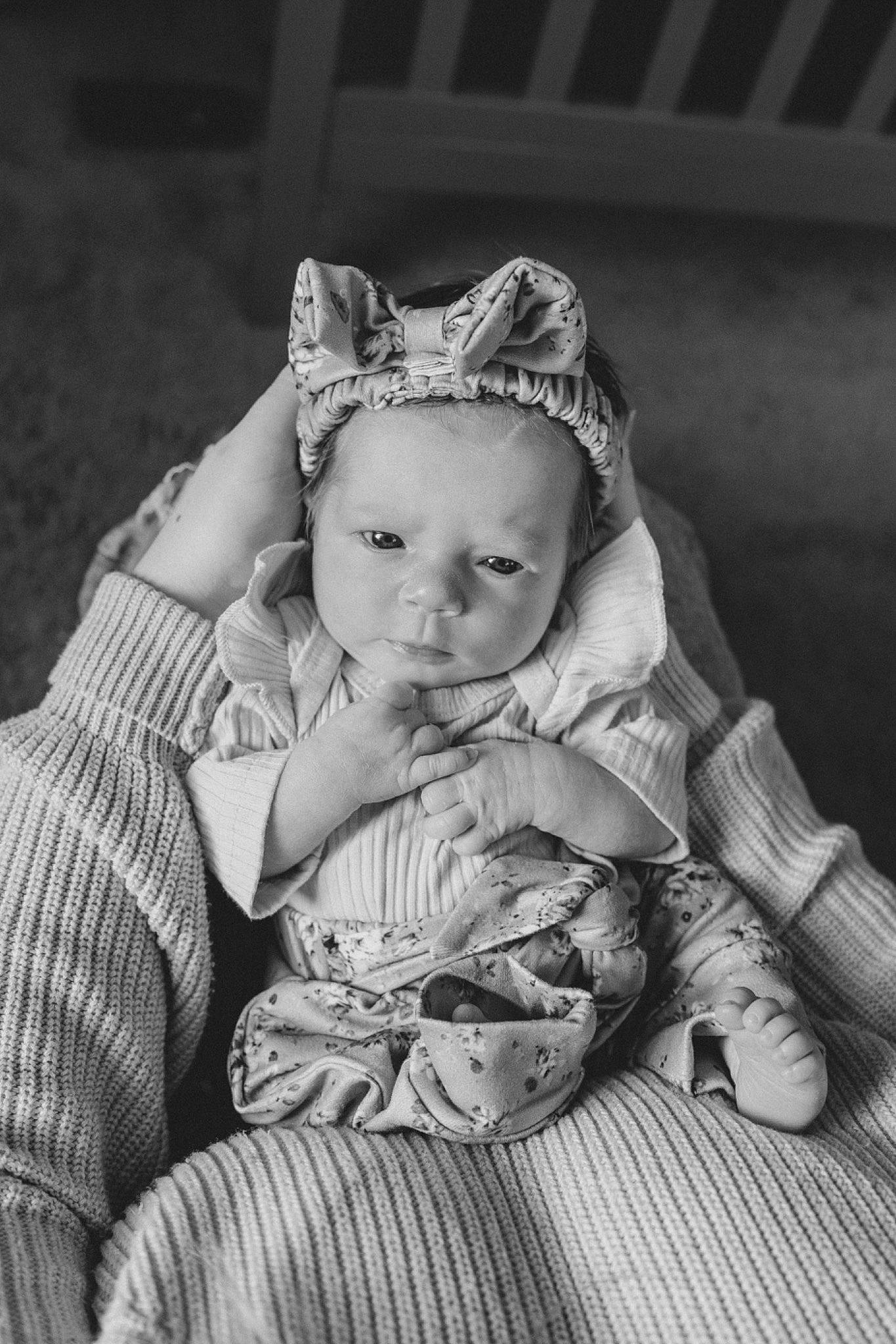 Avalyn is registered to the contest to win money with this photo: baby, baby_toddler_clothing, cheek, child, dress, eye, flash_photography, grass, happy, headband, headpiece, human_body, iris, jewellery, monochrome, monochrome_photography, person, product, sitting, skin