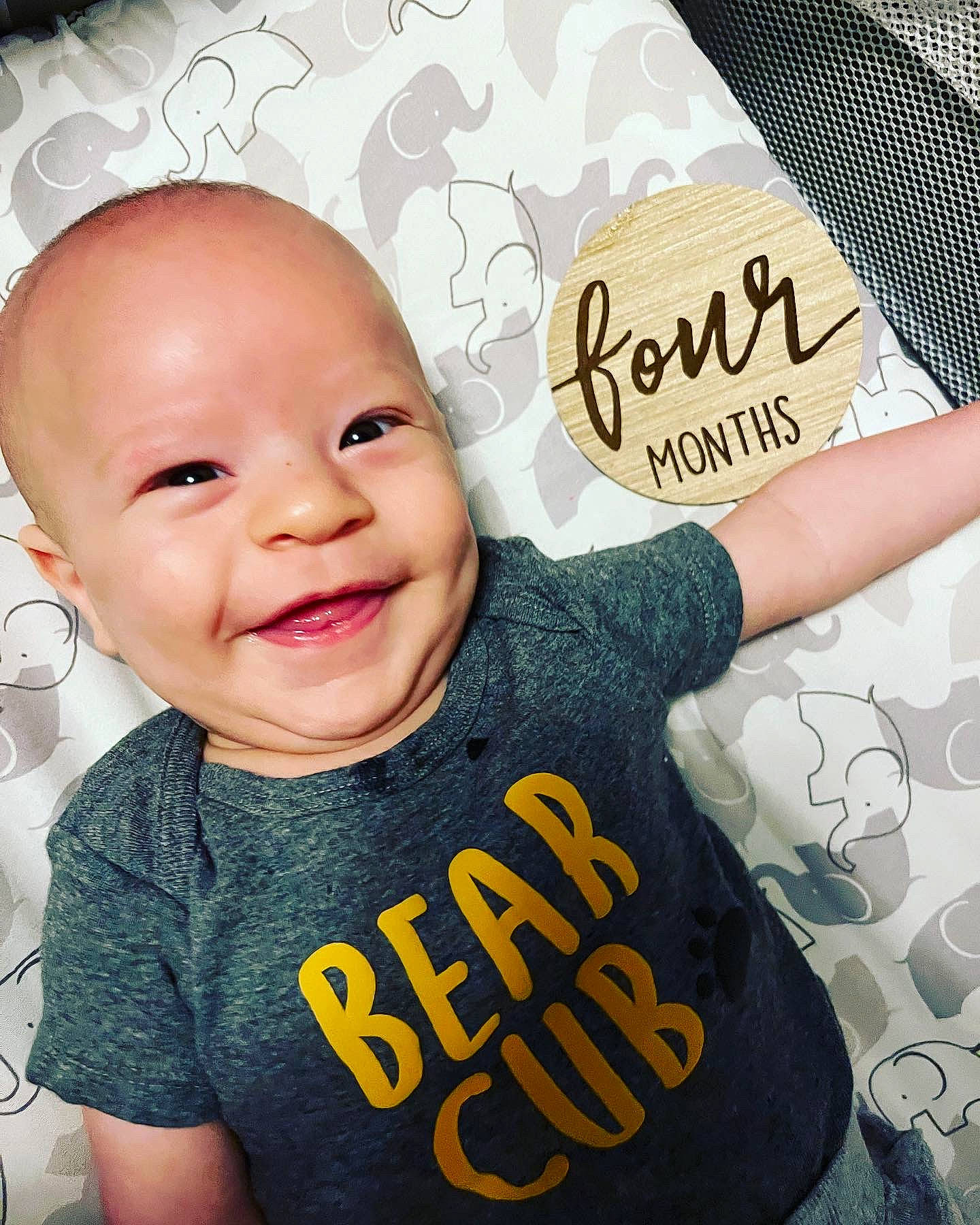 Chase is registered to the contest to win money with this photo: baby, baby_laughing, baby_toddler_clothing, cheek, chin, cool, eye, eyebrow, gesture, hairstyle, happy, head, headgear, human, neck, person, product, sleeve, smile, t_shirt