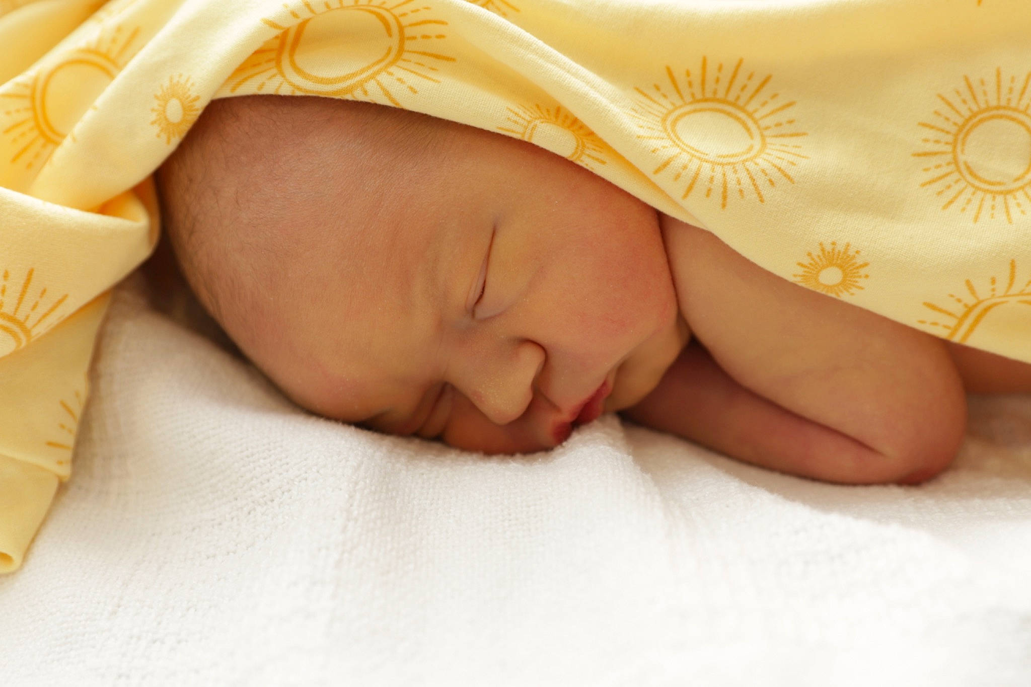 Chase is registered to the contest to win money with this photo: baby, baby_sleeping, bedding, bedtime, child, comfort, fashion_accessory, finger, font, happy, linens, nap, pattern, peach, person, portrait_photography, room, skin, sleep, toddler