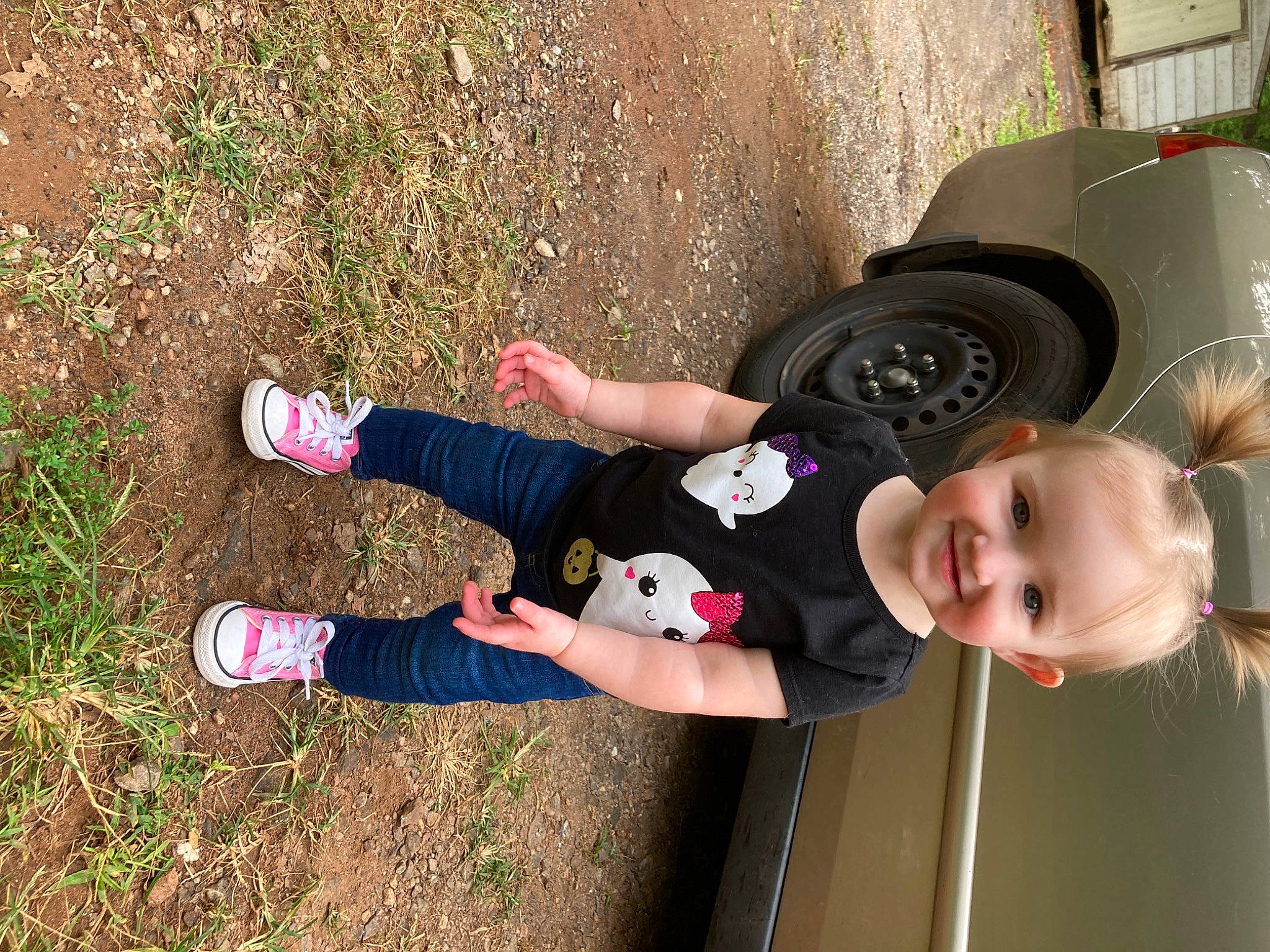 Paisley joined the competition — help win amazing prizes! automotive_exterior, automotive_tire, automotive_wheel_system, baby_toddler_clothing, car, carmine, child, fender, fun, grass, hat, joy, people_in_nature, person, public_space, smile, sneakers, tire, toddler, vehicle