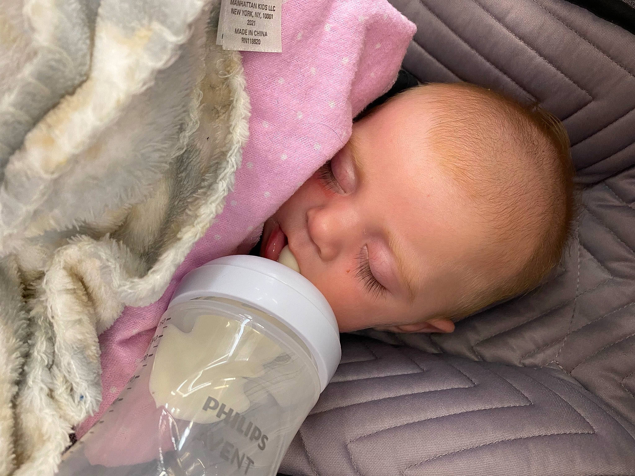 Brynn joined the competition — help win amazing prizes! baby, baby_bottle, bottle, cheek, child, comfort, drinkware, eye, eyebrow, eyelash, face, finger, hand, head, mouth, nail, nose, person, plastic_bottle, skin