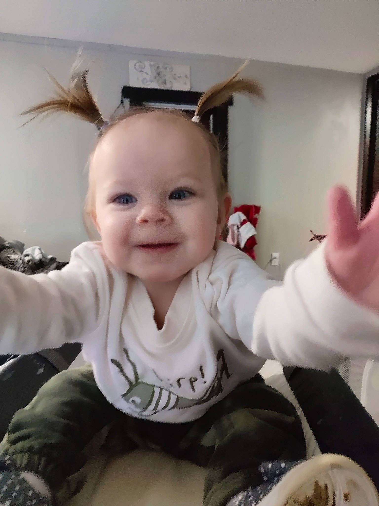 Anastasia is registered to the contest to win money with this photo: arm, baby, baby_toddler_clothing, chair, cheek, child, comfort, ear, finger, flooring, fun, gesture, happy, head, joy, person, sitting, skin, sleeve, smile