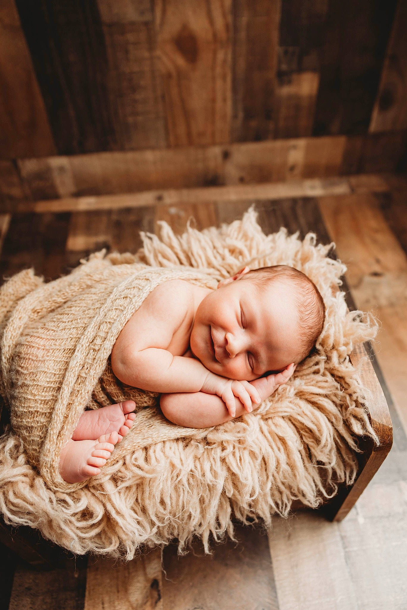 Jackson is registered to the contest to win money with this photo: baby, baby_sleeping, baby_toddler_clothing, bedding, child, comfort, fashion_accessory, flash_photography, flooring, fur, happy, hardwood, head, headgear, headpiece, joy, linens, peach, person, sitting