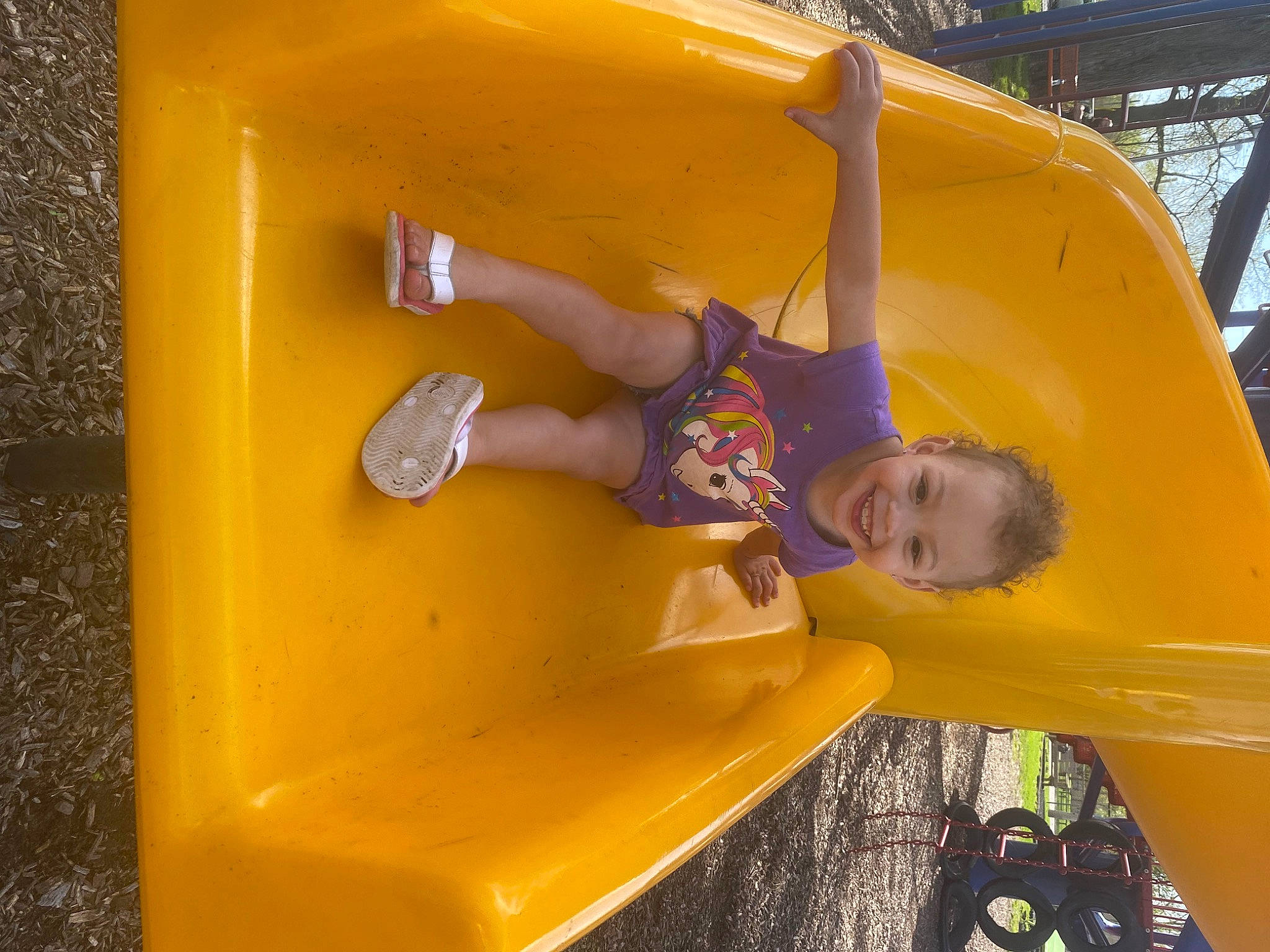 Kierra joined the competition — help win amazing prizes! automotive_exterior, bumper, child, chute, city, fun, games, joy, leisure, outdoor_play_equipment, person, play, playground, playground_slide, recreation, shoe, shorts, smile, sneakers, thigh