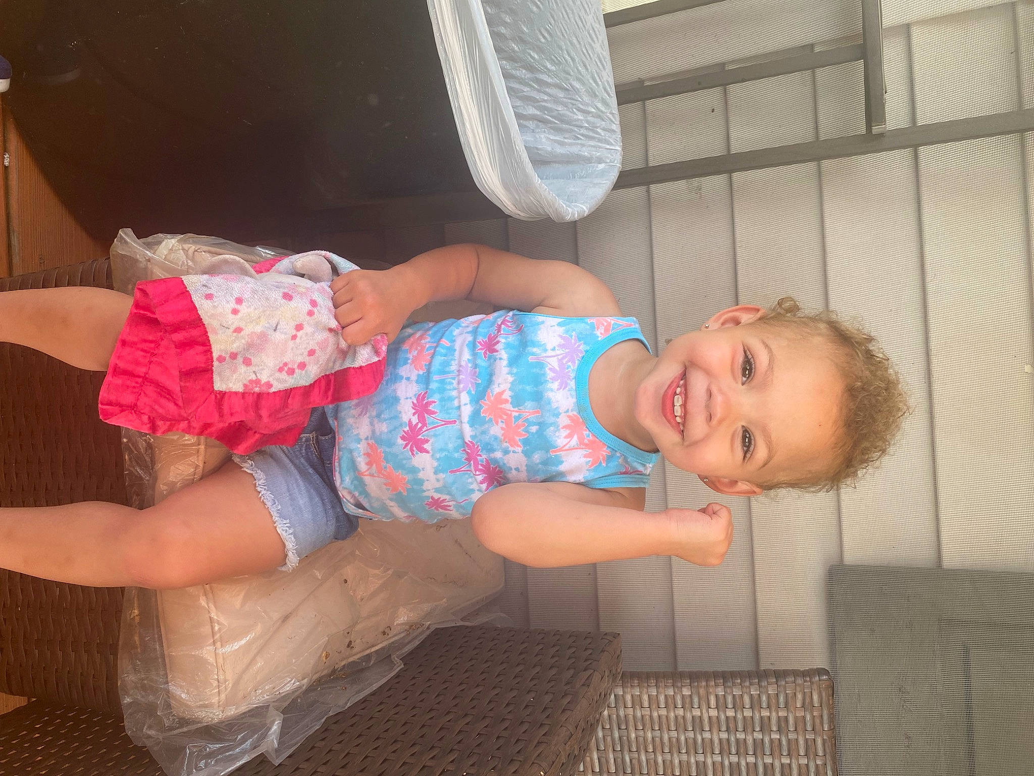 Kierra is registered to the contest to win money with this photo: baby, baby_toddler_clothing, child, comfort, finger, foot, fun, human_body, human_leg, joy, knee, lap, leg, pattern, person, shorts, smile, sock, textile, thigh
