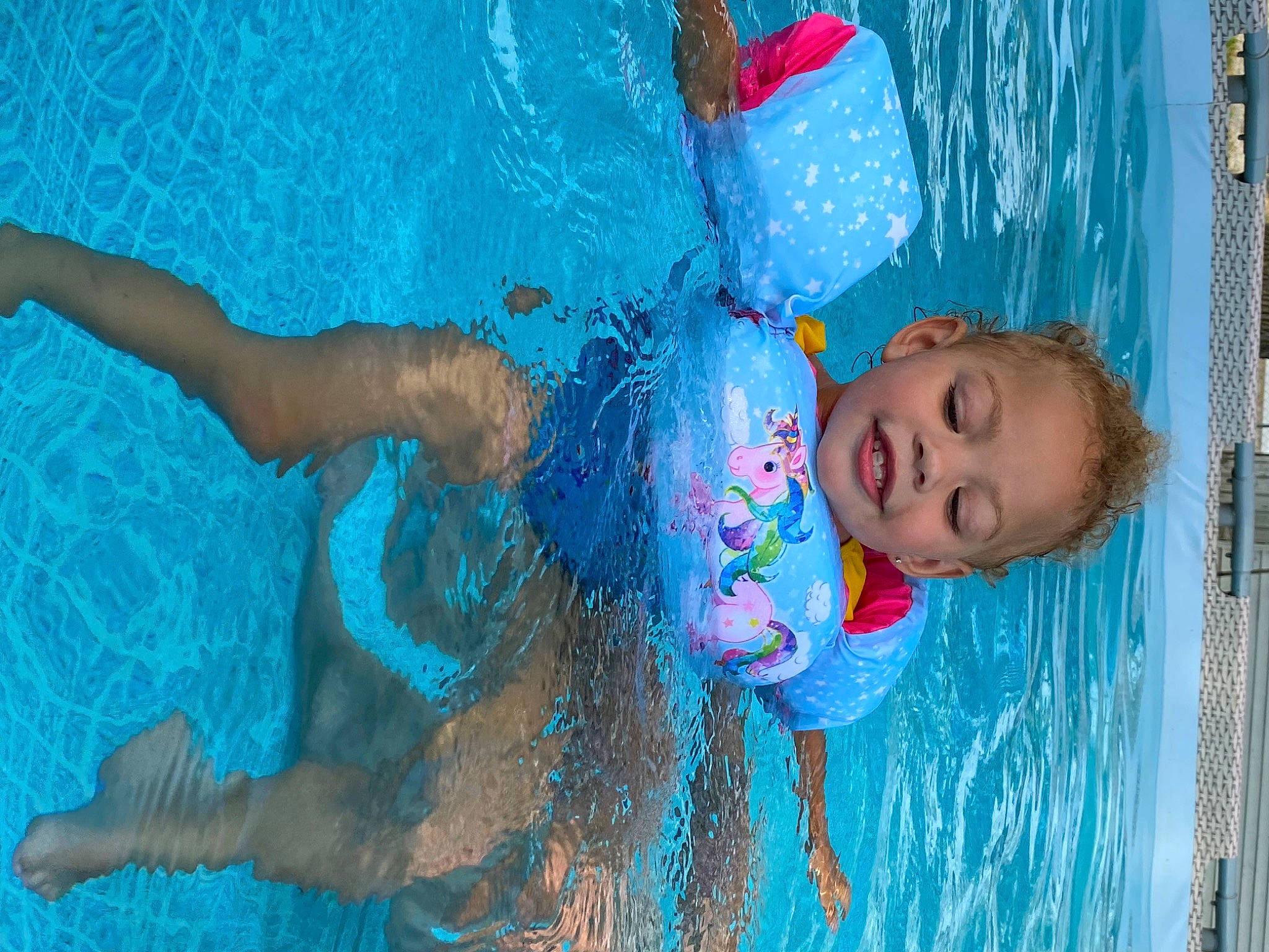 Kierra joined the competition — help win amazing prizes! aqua, azure, bathing, blue, child, electric_blue, fun, happy, joy, leisure, leisure_centre, magenta, pattern, person, play, recreation, red, swimming_pool, toddler, vacation