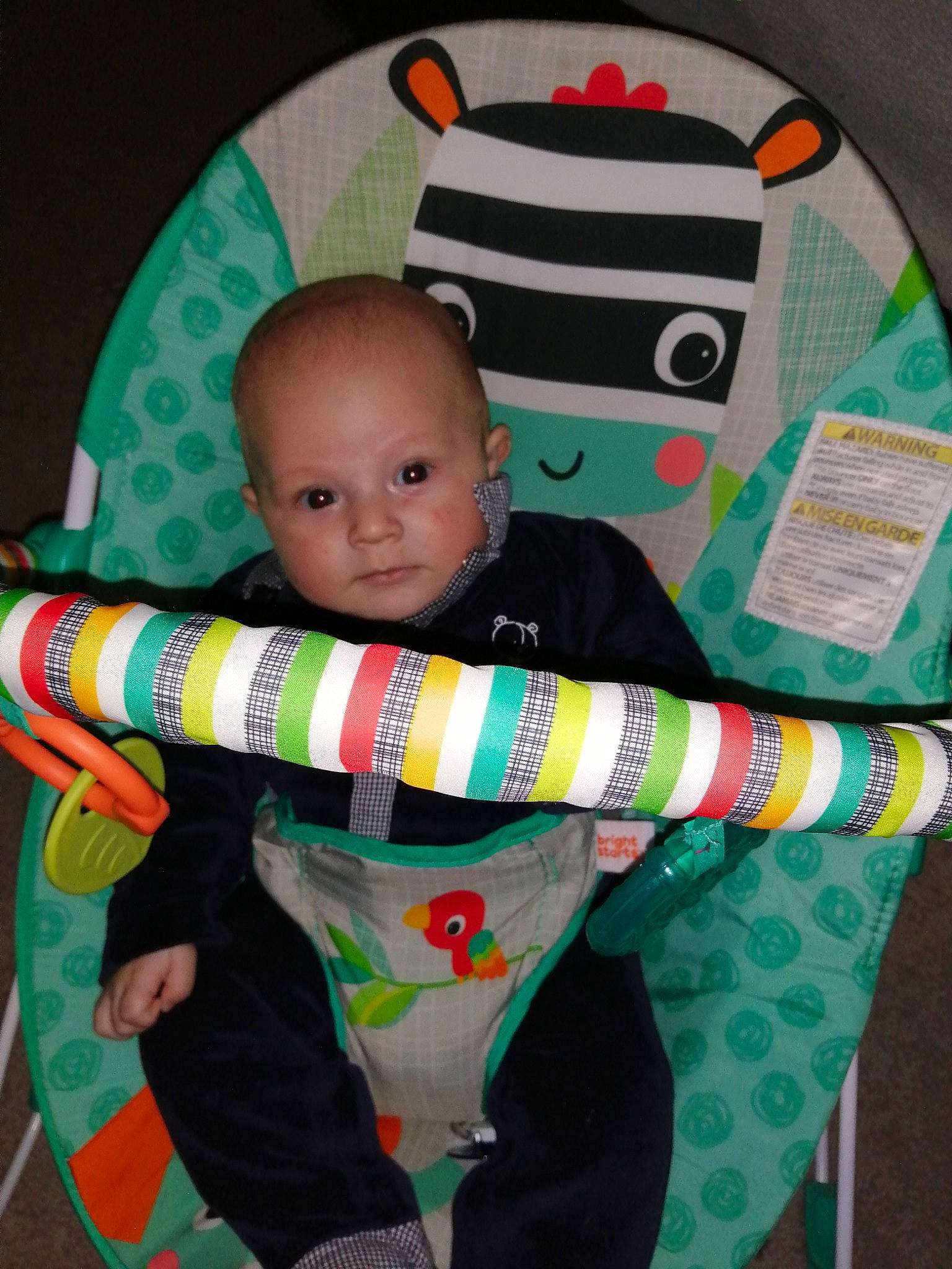 Lâyann a rejoint le concours — aidez-le/la à gagner de superbes lots ! baby, baby_products, baby_toddler_clothing, bag, chair, child, comfort, fashion_accessory, happy, head, linens, pattern, person, product, room, sitting, sleeve, smile, t_shirt, toddler