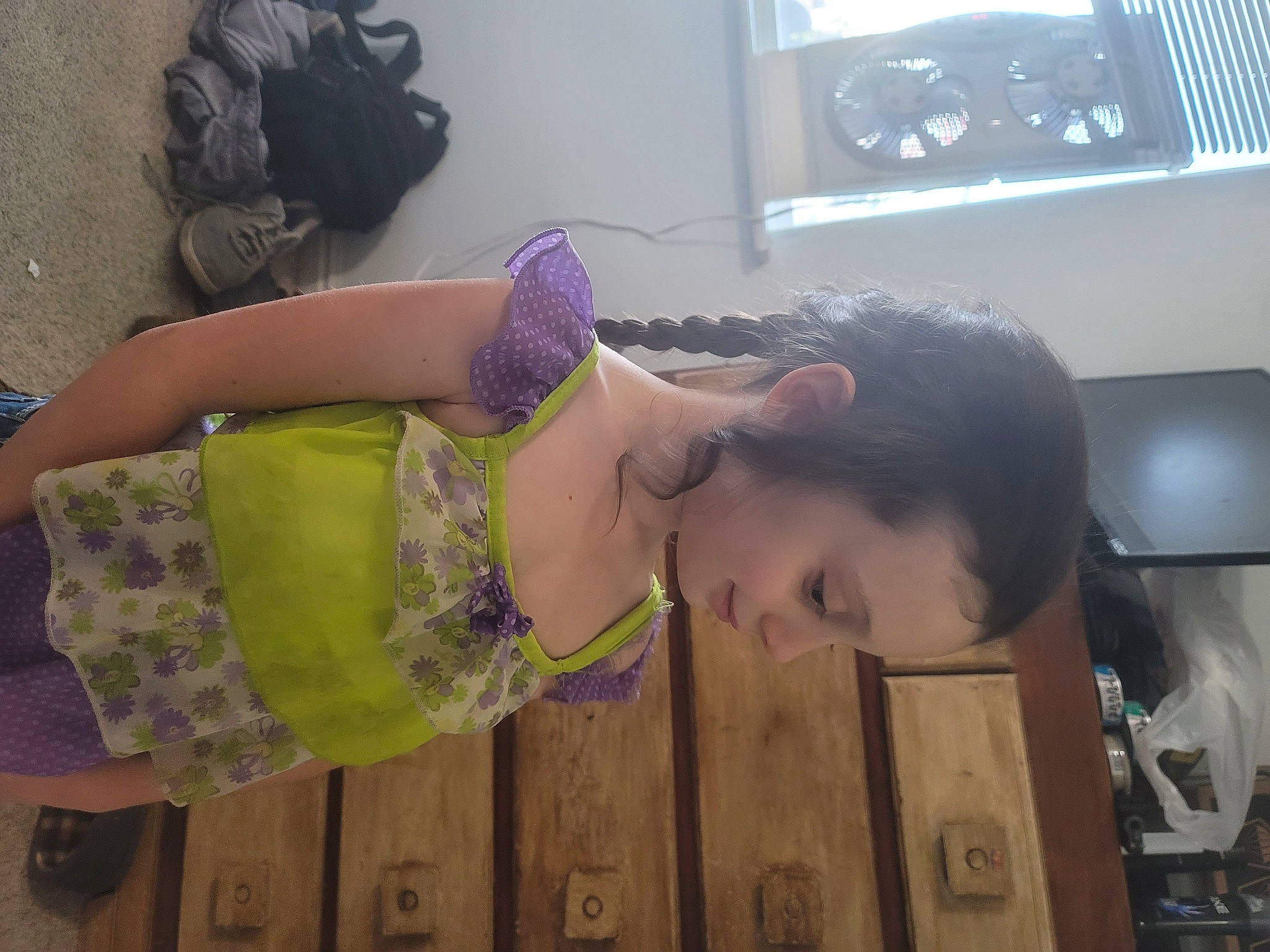 Sarah is registered to the contest to win money with this photo: audio_equipment, black_hair, chest, child, finger, flooring, fun, happy, home_appliance, human_leg, joint, mouth, pattern, person, shoulder, skin, smile, thigh, trunk, waist