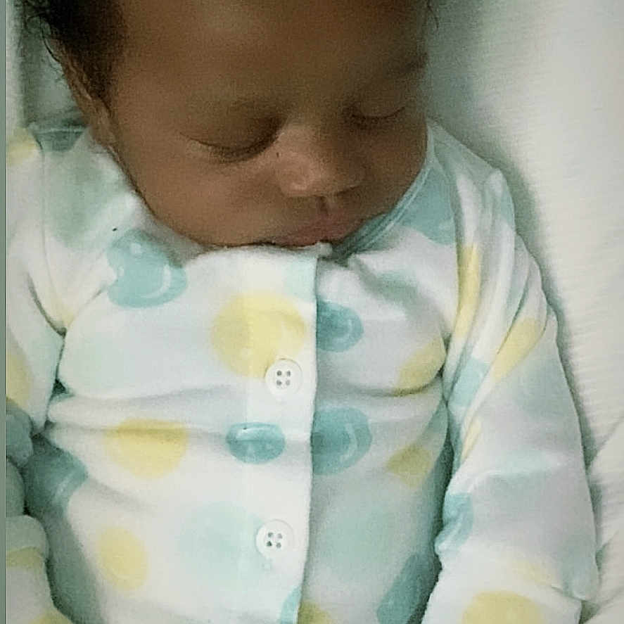 Ocean joined the competition — help win amazing prizes! baby, sleeping, infant, onesie, polka_dot, blanket, peaceful, cute, child, newborn, face, hand, cozy, indoor, portrait, soft_lighting, resting, young_child, sleep, clothing
