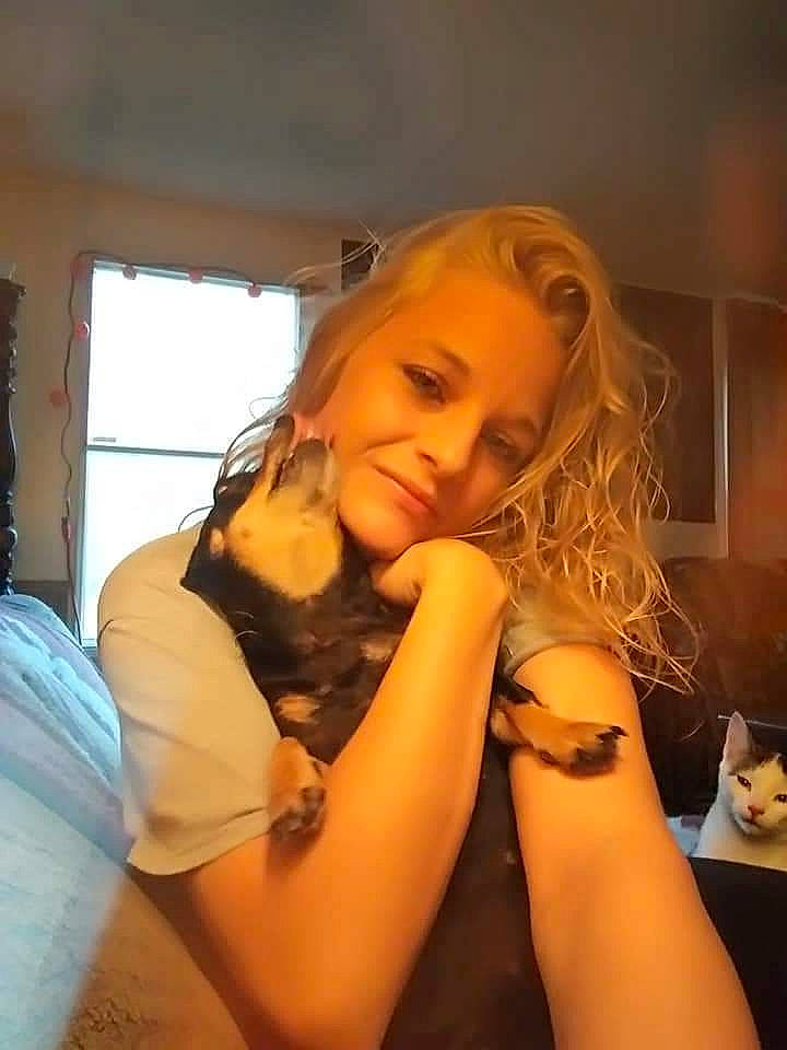 Mini is registered to the contest to win money with this photo: arm, comfort, dress, elbow, eyelash, finger, flash_photography, gesture, hairstyle, hand, happy, human_body, mammal, mouth, neck, shoulder, smile, tableware, thigh, window