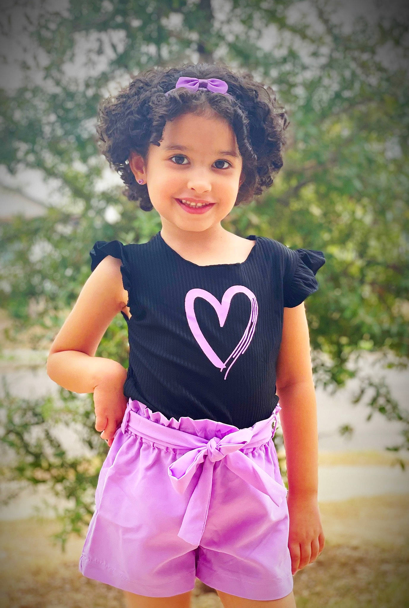Kiana joined the competition — help win amazing prizes! baby_toddler_clothing, day_dress, electric_blue, fashion_design, formal_wear, fun, grass, hair, happy, head, iris, joy, magenta, pattern, person, pink, purple, sleeve, smile, t_shirt