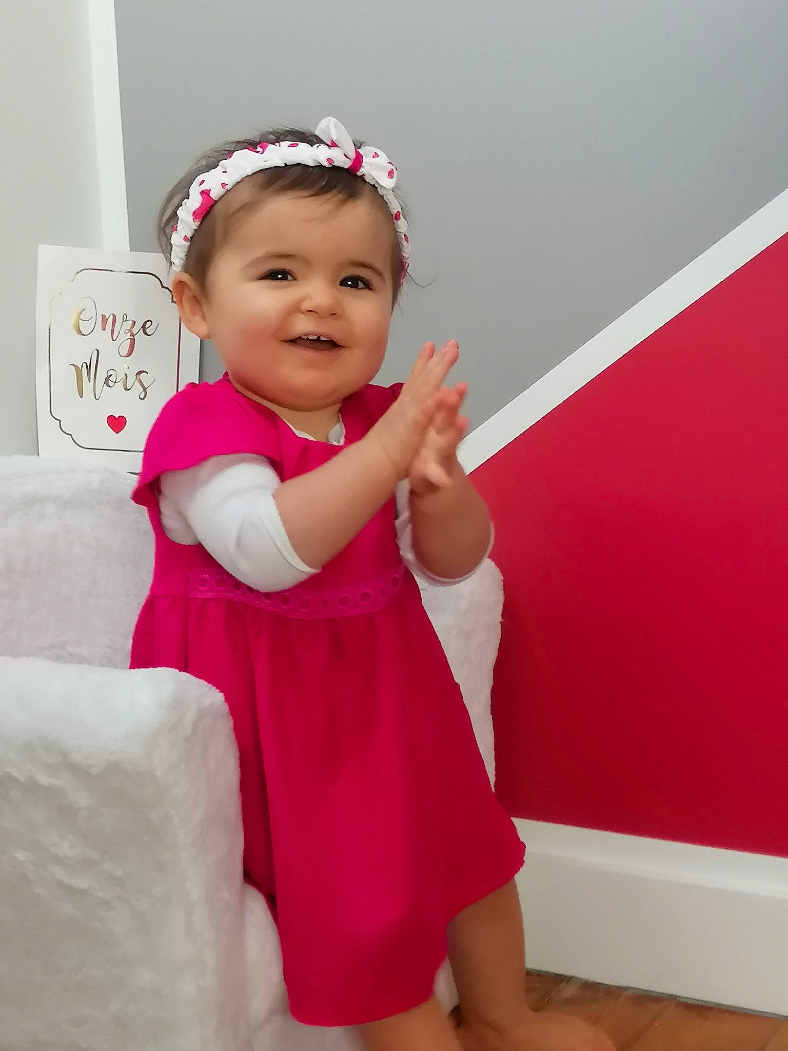 Louna participe au concours pour gagner de l'argent avec cette photo : baby_toddler_clothing, child, clothing, dress, facial_expression, finger, flash_photography, gesture, happy, head, headpiece, joy, neck, one_piece_garment, people, person, pink, skin, sleeve, smile