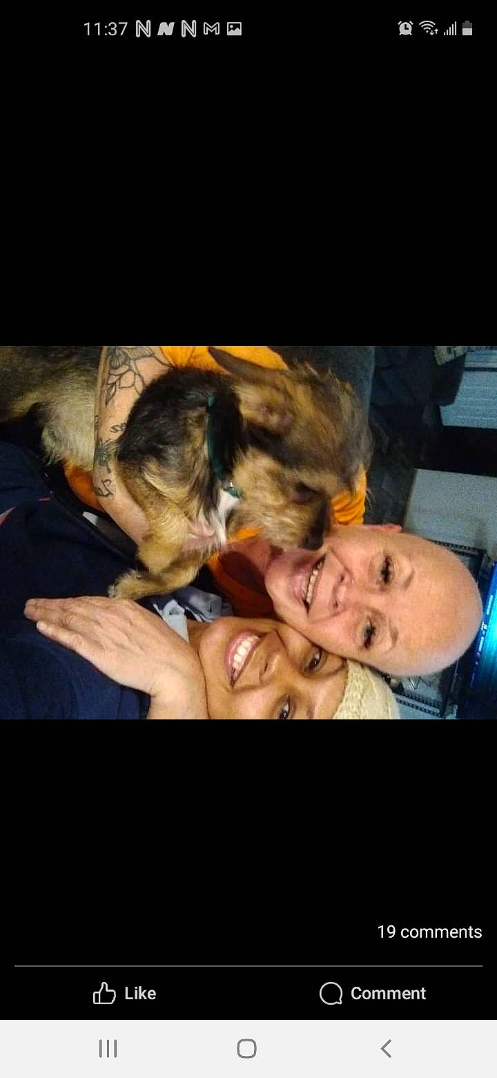 Roscoe is registered to the contest to win money with this photo: abdomen, child, event, flash_photography, flesh, fun, fur, gesture, happy, hug, jaw, laugh, love, mouth, night, photo_caption, romance, room, selfie, smile