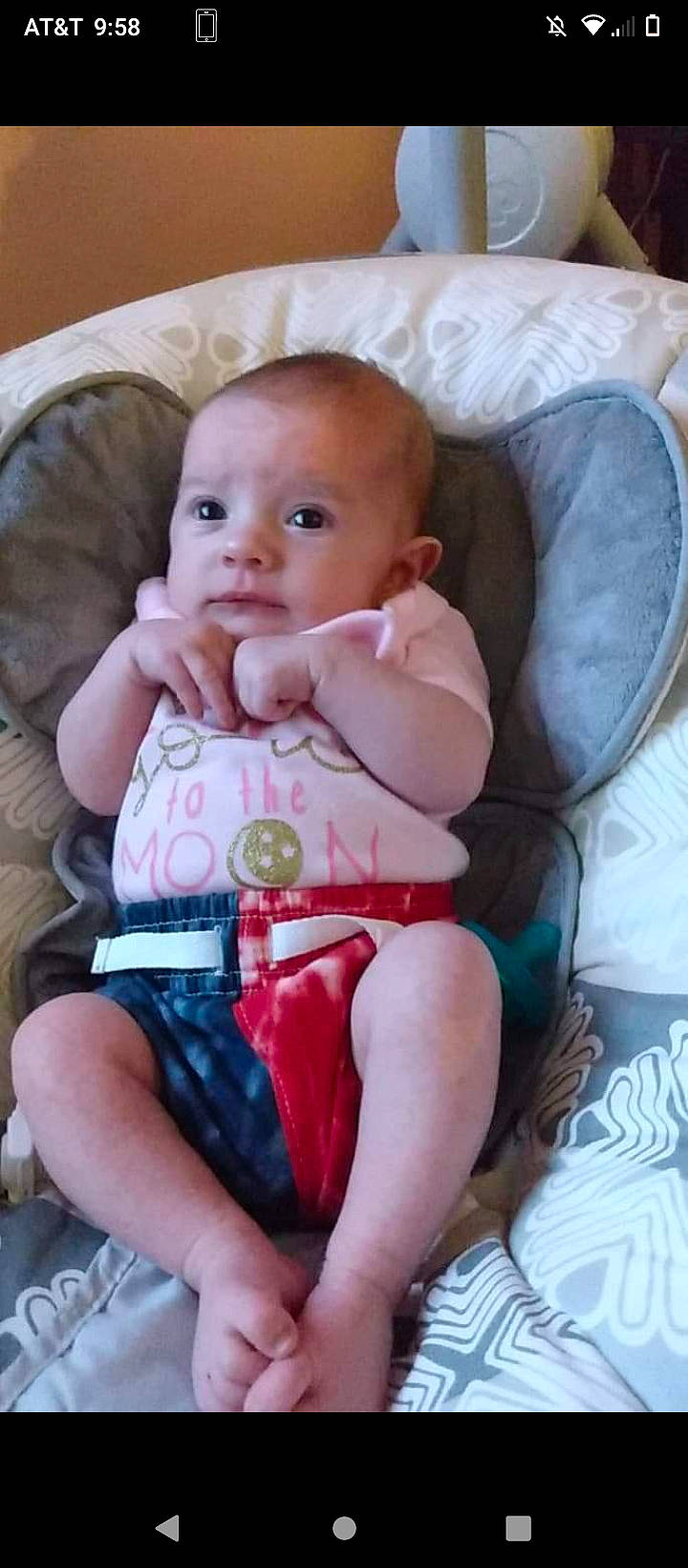 Natalie joined the competition — help win amazing prizes! baby, baby_toddler_clothing, chair, cheek, child, comfort, dress, eye, finger, hand, head, iris, lap, lip, mouth, person, pink, skin, sleeve, textile