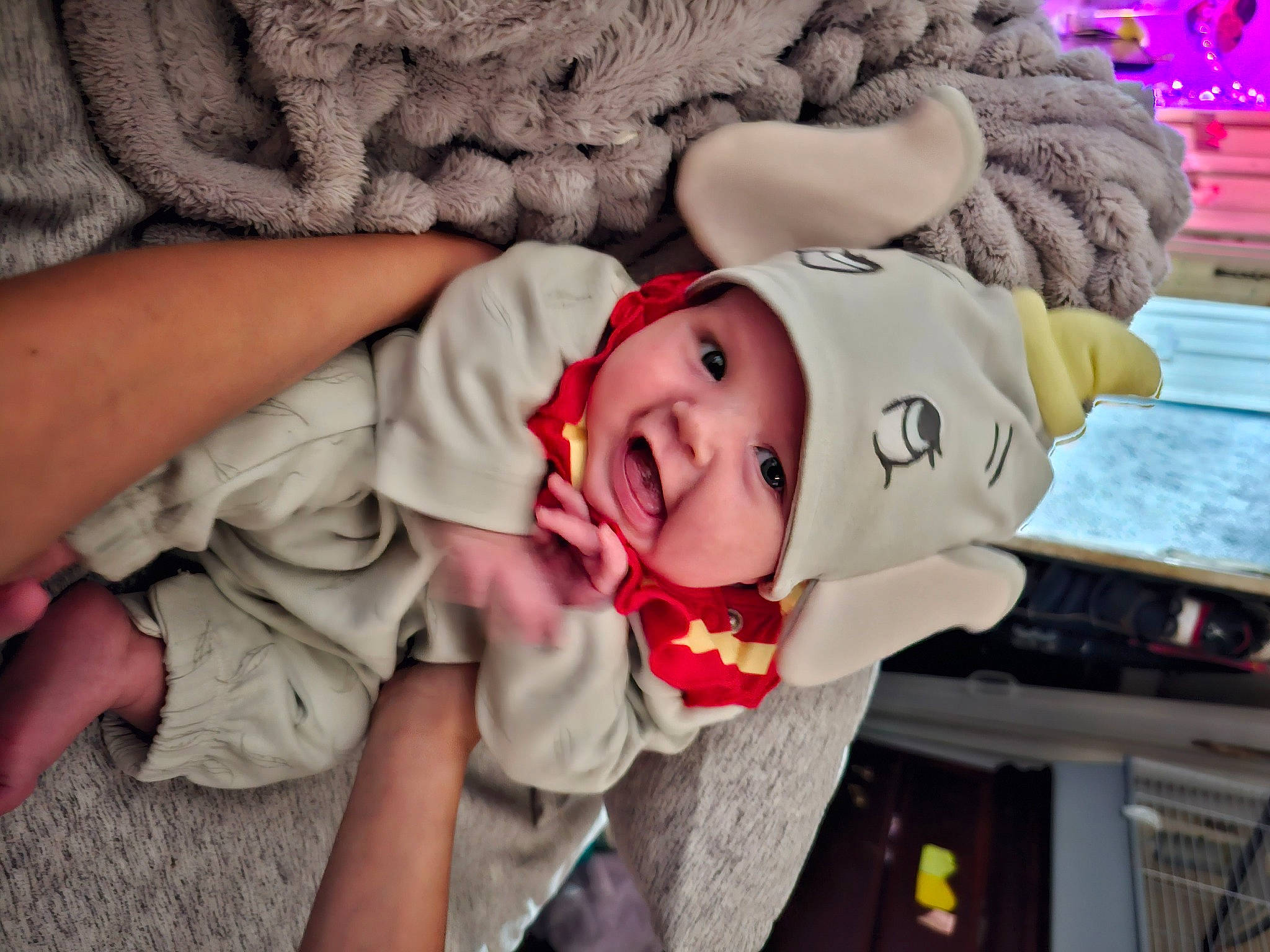 Amethyst is registered to the contest to win money with this photo: baby, baby_products, baby_toddler_clothing, bedtime, child, comfort, fun, fur, happy, hat, headgear, headwear, mouth, pattern, person, plush, room, smile, stuffed_toy, toddler