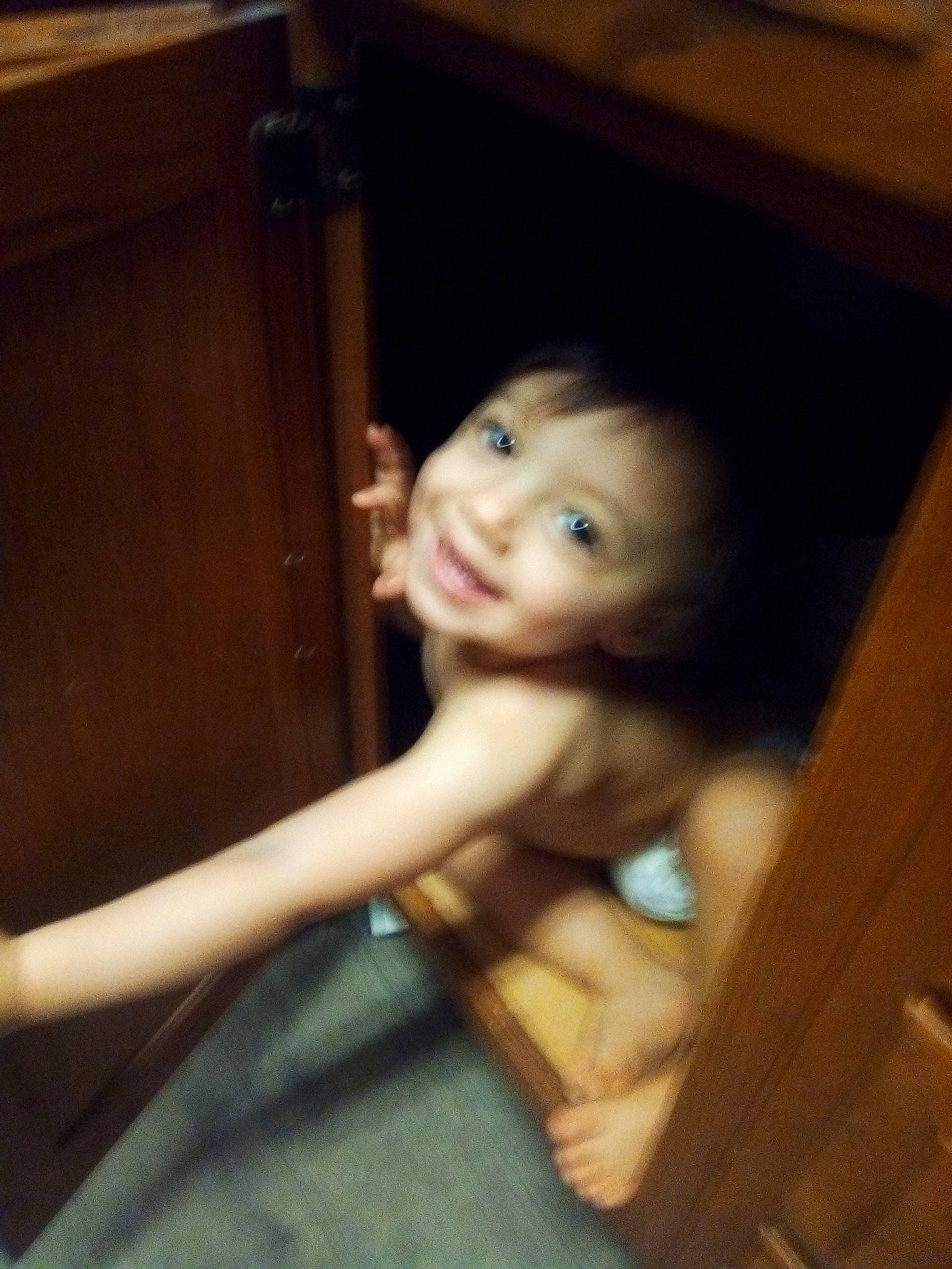 Kieran is registered to the contest to win money with this photo: black_hair, cheek, chest, child, eye, face, fawn, fun, head, joy, long_hair, mouth, nose, person, skin, smile, toddler, wood