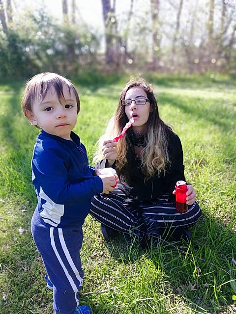 Kieran joined the competition — help win amazing prizes! child, grass, happy, long_hair, people_in_nature, person, photography, plant, play, sibling, sitting, smile, toddler, tree