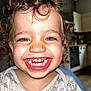 Santiago participe au concours pour gagner de l'argent avec cette photo : toddler, child, smile, curly_hair, teeth, onesie, indoor, kitchen, happy, face, portrait, baby, joyful, cute, clothing, person, closeup, expression, young_child, background