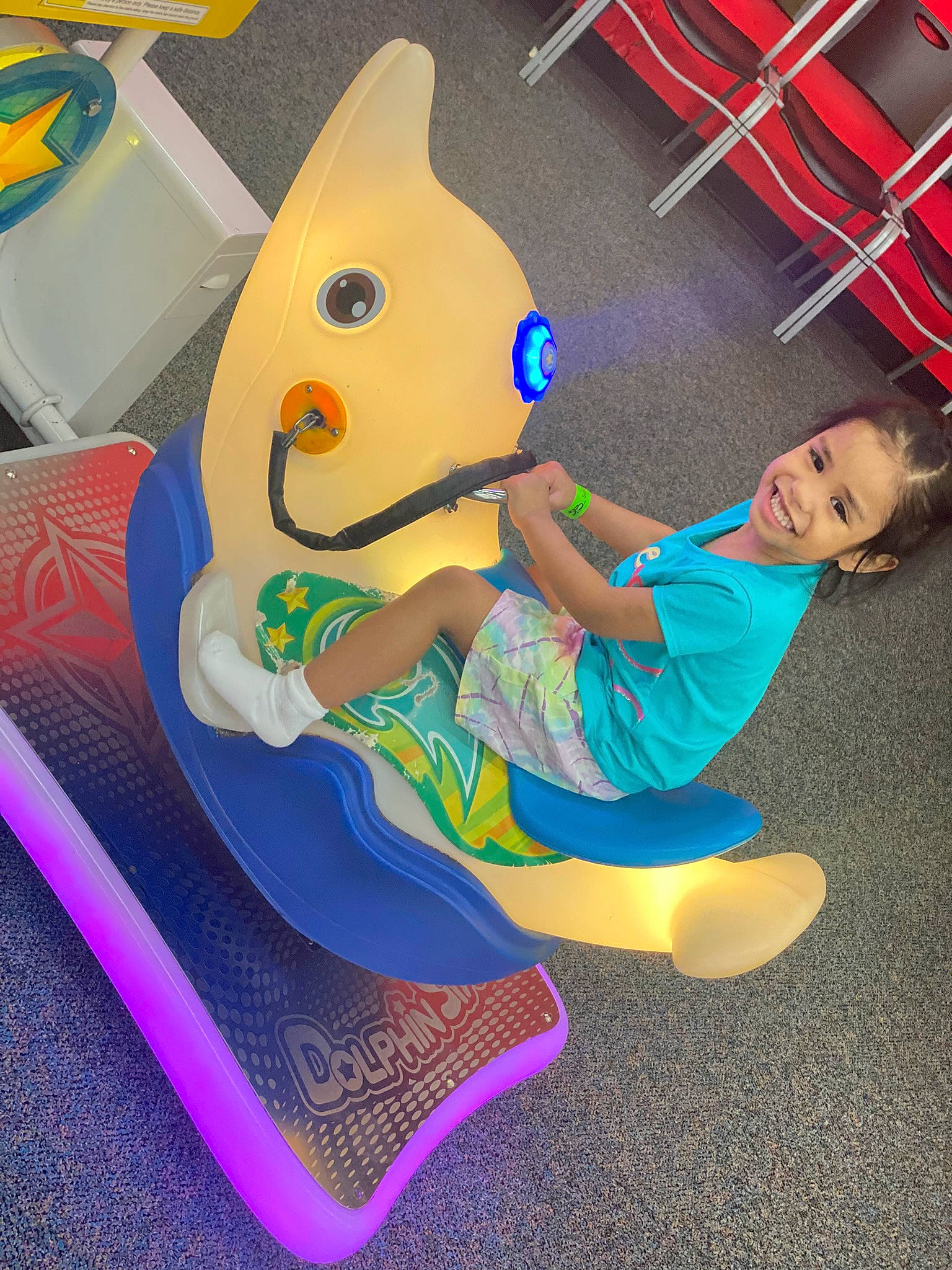 Moana is registered to the contest to win money with this photo: animated_cartoon, animation, child, electric_blue, entertainment, fictional_character, fun, games, happy, joy, leg, leisure, magenta, person, play, plush, recreation, sandal, shoe, sitting