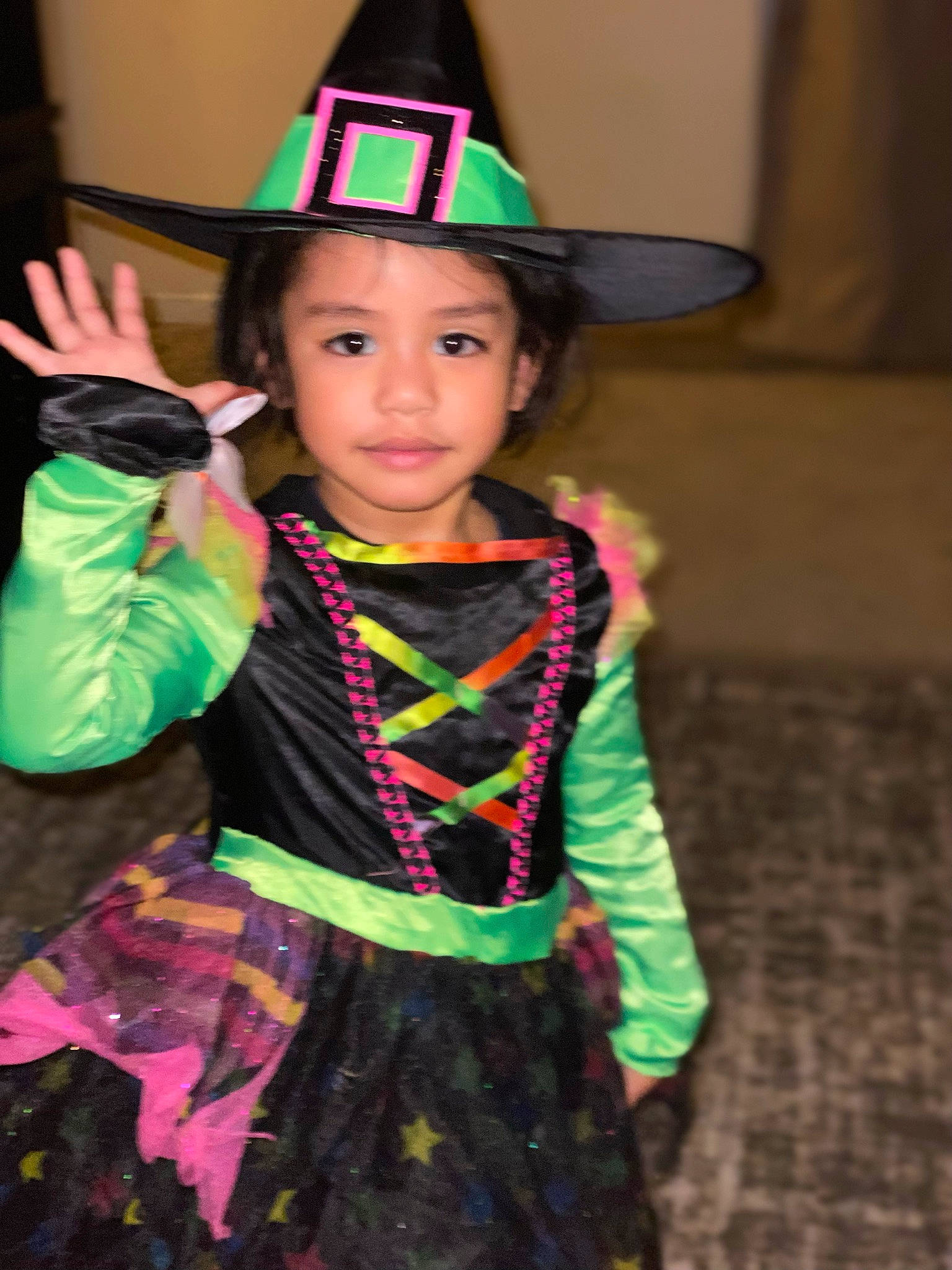 Moana is registered to the contest to win money with this photo: child, costume_hat, entertainment, event, fashion_accessory, fashion_design, fun, hat, headgear, headwear, magenta, party_hat, performing_arts, person, personal_protective_equipment, pink, purple, sun_hat, toddler, tradition