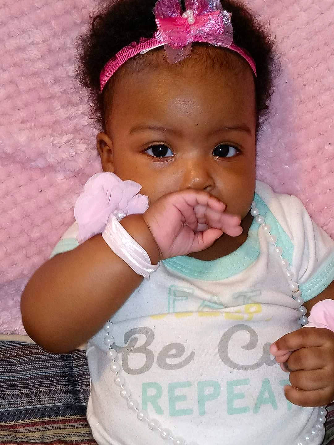 Maliyah joined the competition — help win amazing prizes! baby, baby_toddler_clothing, cheek, ear, eye, eyebrow, eyelash, face, finger, gesture, hand, happy, head, iris, lip, neck, nose, person, pink, skin