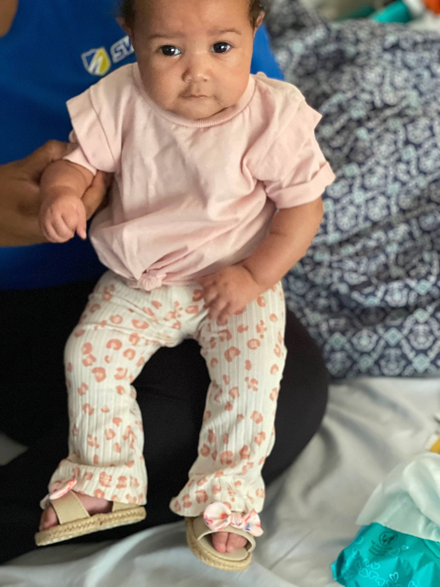 Malayiah is registered to the contest to win money with this photo: baby, baby_toddler_clothing, cheek, child, collar, foot, green, happy, human_leg, knee, magenta, pattern, peach, person, sitting, sleeve, sock, t_shirt, toddler