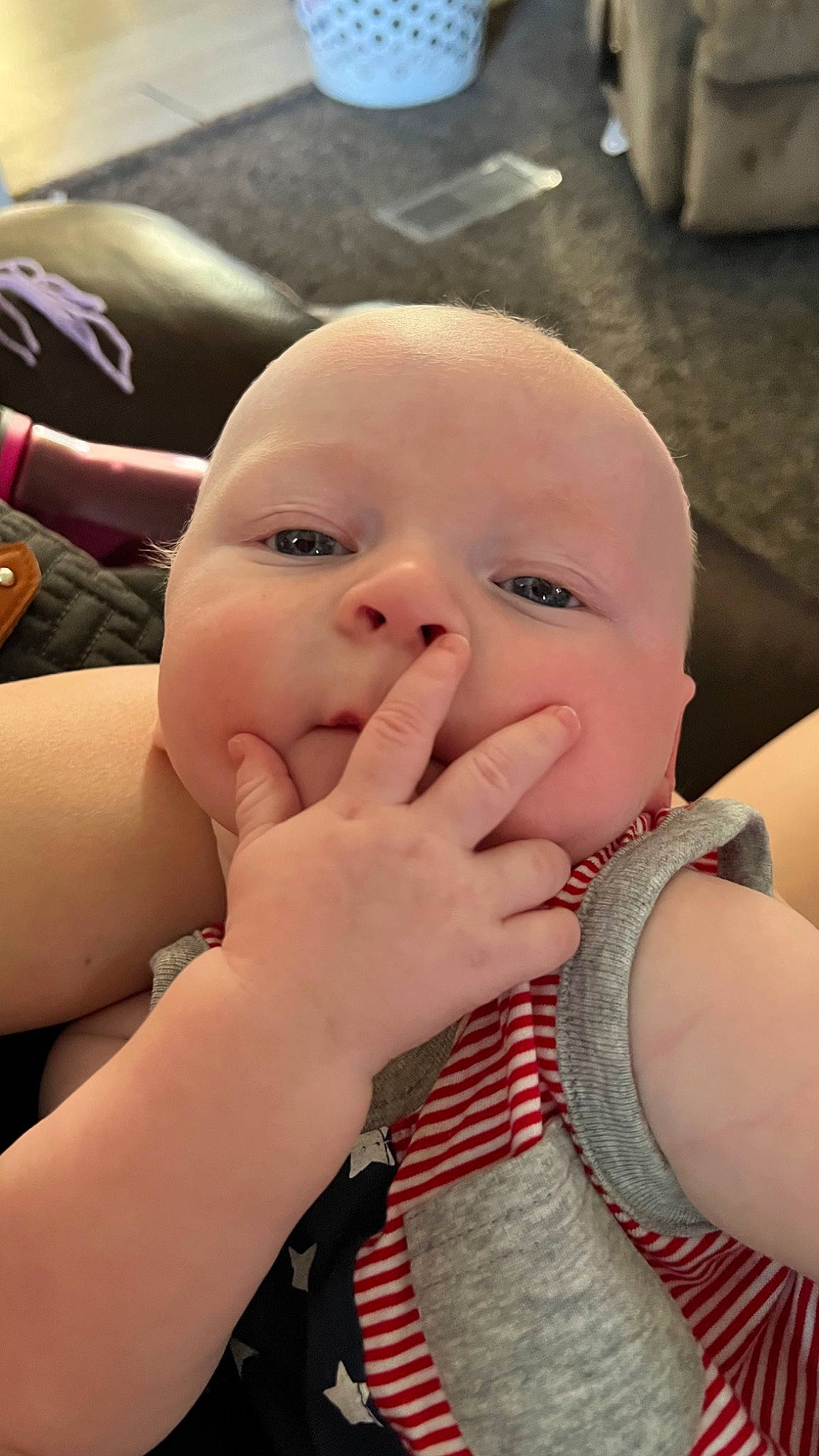 Jensen is registered to the contest to win money with this photo: baby, baby_toddler_clothing, cheek, comfort, eye, eyelash, facial_expression, finger, fun, gesture, happy, iris, lip, mouth, nail, nose, person, skin, smile, thumb