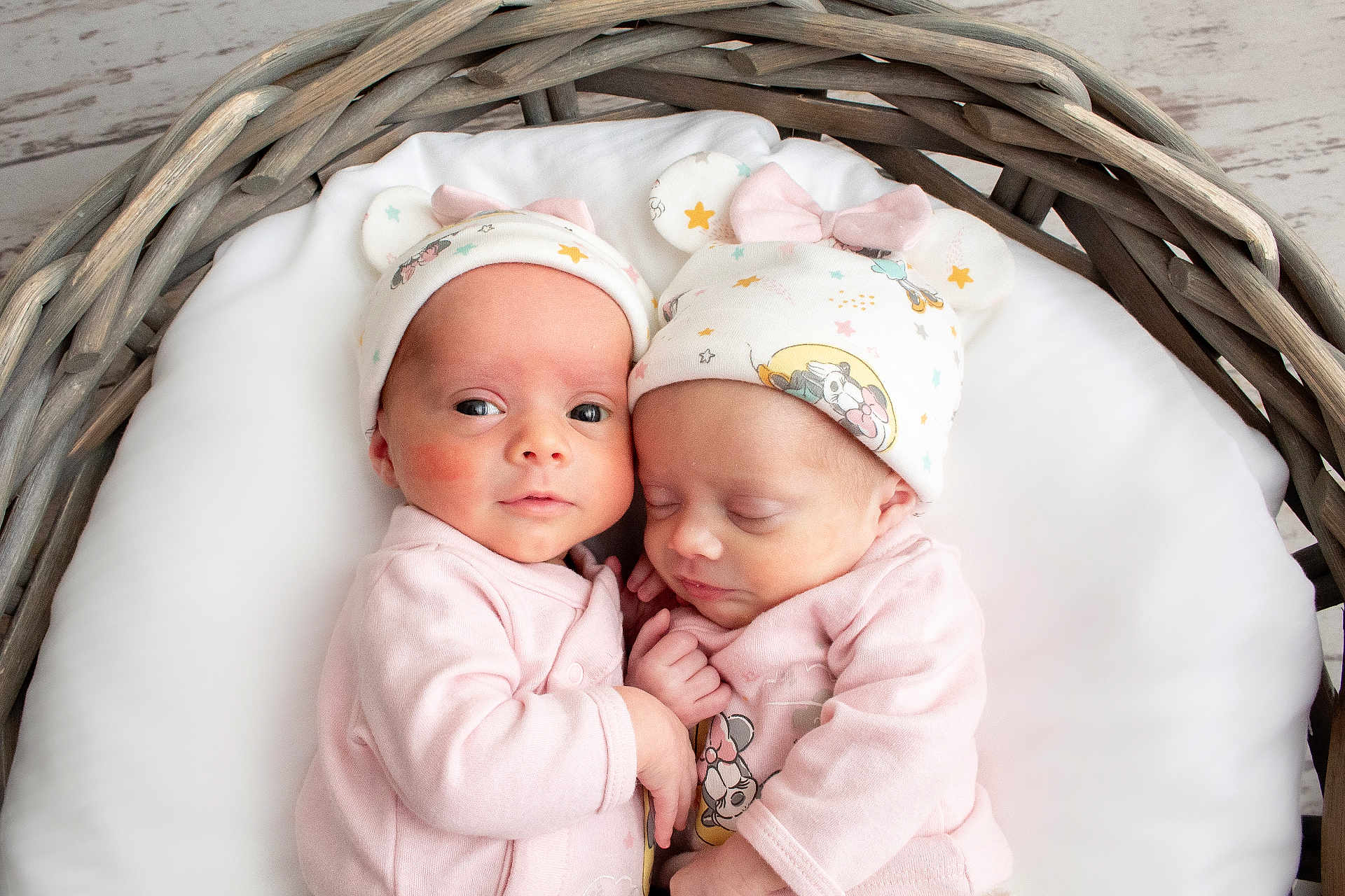 Kaiya And Delilah joined the competition — help win amazing prizes! newborn, twins, baby, basket, pink_clothing, hat, sleeping, awake, cute, infant, matching_outfits, cozy, soft, closeup, portrait, indoor, child, adorable, sleep, curious