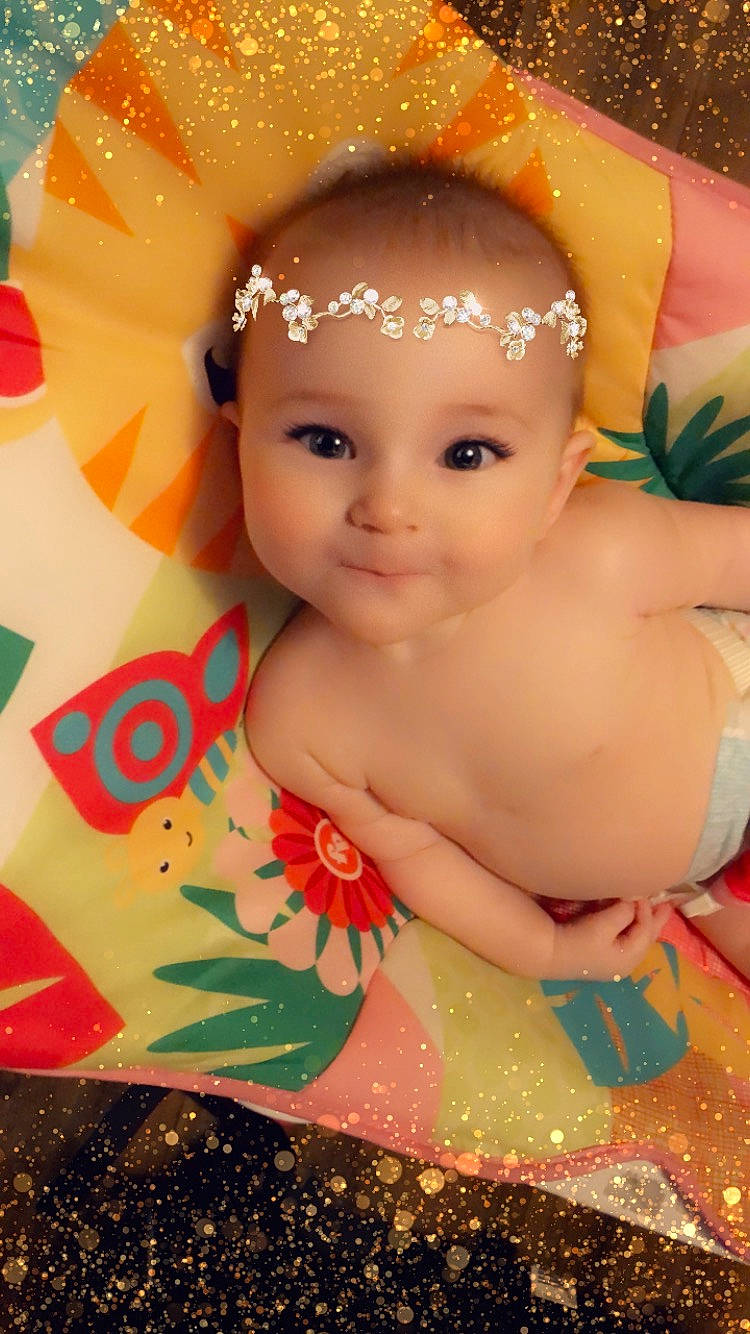 Riley joined the competition — help win amazing prizes! baby, cheek, child, eye, face, forehead, hair_accessory, head, iris, lip, person, skin, toddler