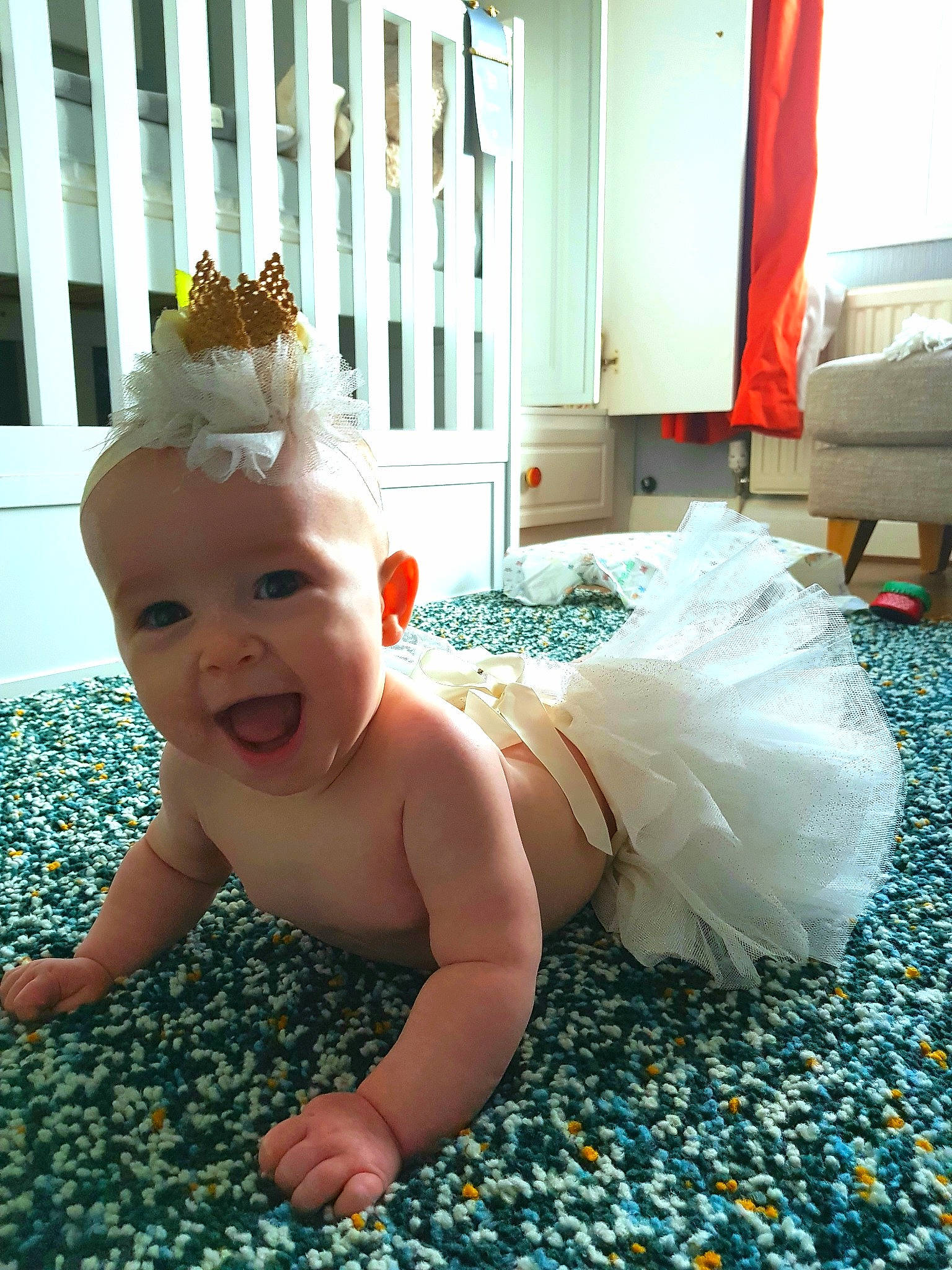 Alma joined the competition — help win amazing prizes! baby, baby_products, baby_toddler_clothing, child, costume, crawling, dress, floor, flooring, fun, grass, hair_accessory, head, person, room, skin, smile, toddler, vacation, yellow