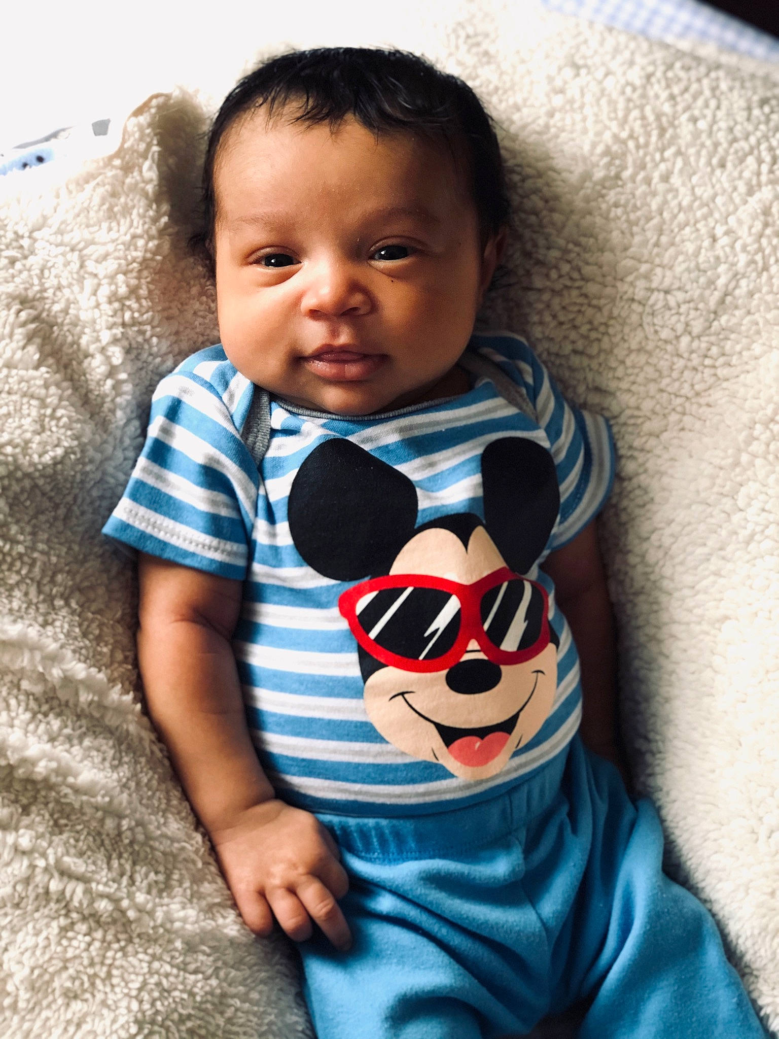 Raheem is registered to the contest to win money with this photo: baby, baby_products, baby_toddler_clothing, cheek, child, cool, head, person, product, skin, toddler