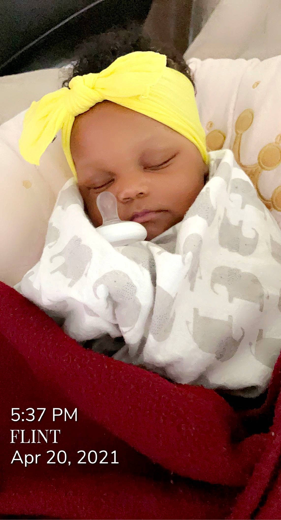 Lenea is registered to the contest to win money with this photo: baby, baby_products, baby_safety, baby_sleeping, baby_toddler_clothing, bedding, cap, carmine, cheek, child, comfort, event, face, facial_expression, font, happy, headwear, linens, person, room