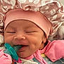 Milani is registered to the contest to win money with this photo: baby, pacifier, sleeping, pink_hat, onesie, dimples, infant, cute, sleepy, child, newborn, soft_fabric, patterned_hat, hand, cozy, indoors, closeup, face, smiling, baby_clothing