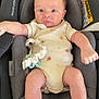 baby, infant, car_seat, maxi_cosi, onesie, pacifier, indoor, cute, child, face, feet, hands, clothing, seatbelt, expression, young, newborn, person, toddler, sitting