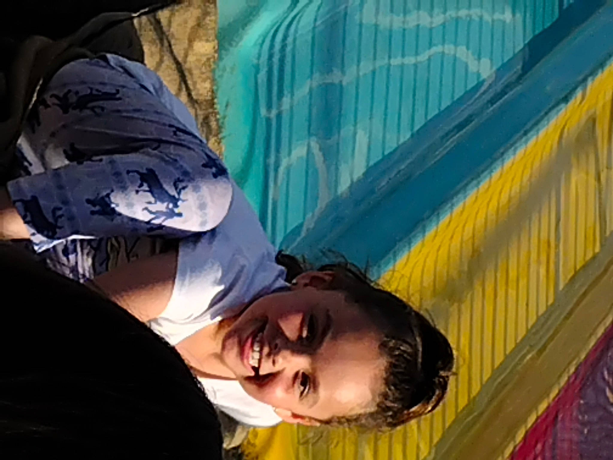 Christianna is registered to the contest to win money with this photo: black_hair, daytime, eyewear, fun, grass, happy, joy, leaf, leisure, mouth, person, recreation, smile, street, tree, visual_arts