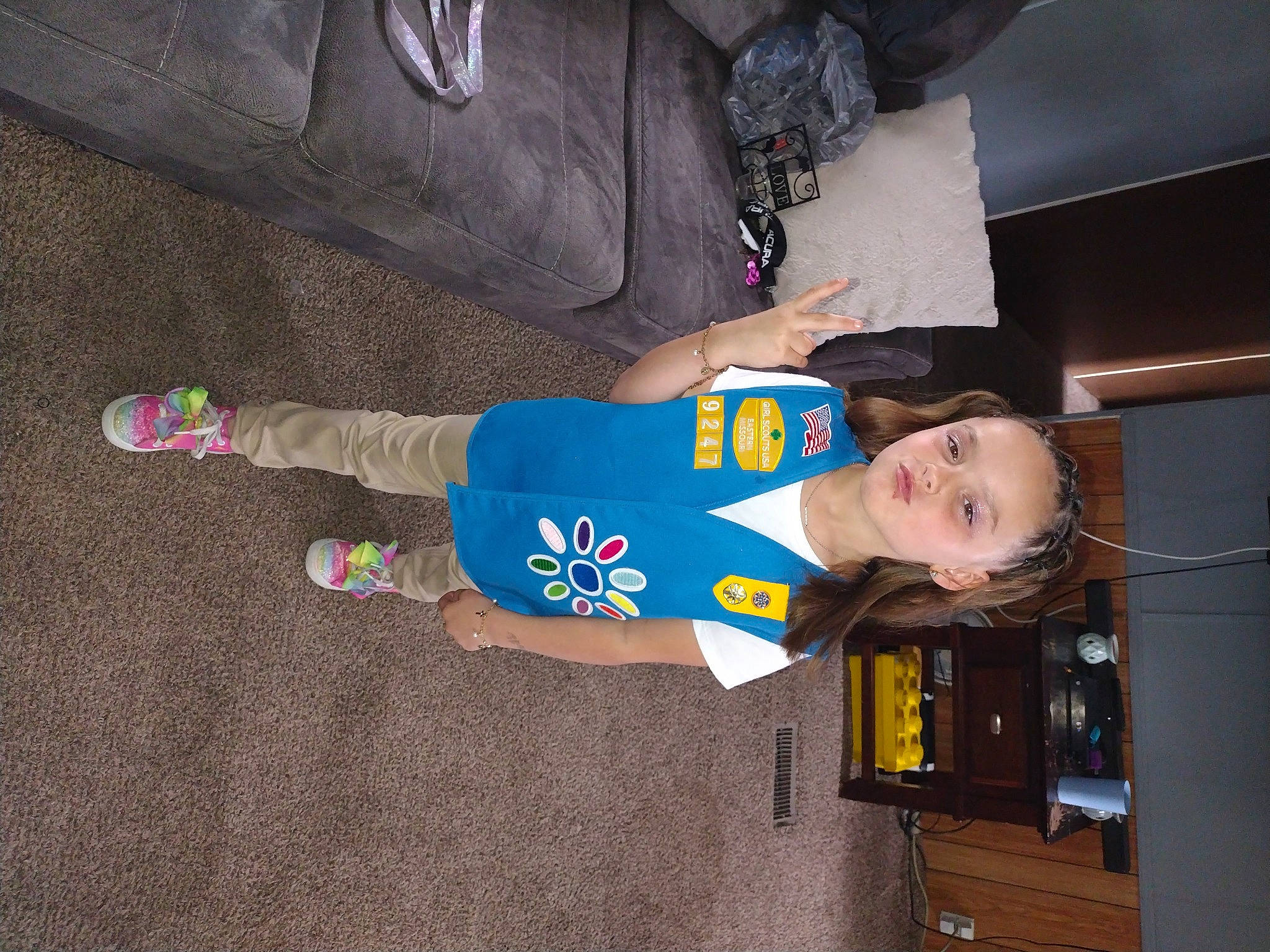 Christianna is registered to the contest to win money with this photo: child, elbow, electric_blue, flooring, fun, person, room, smile, sportswear, t_shirt, thigh, toddler, walking_shoe