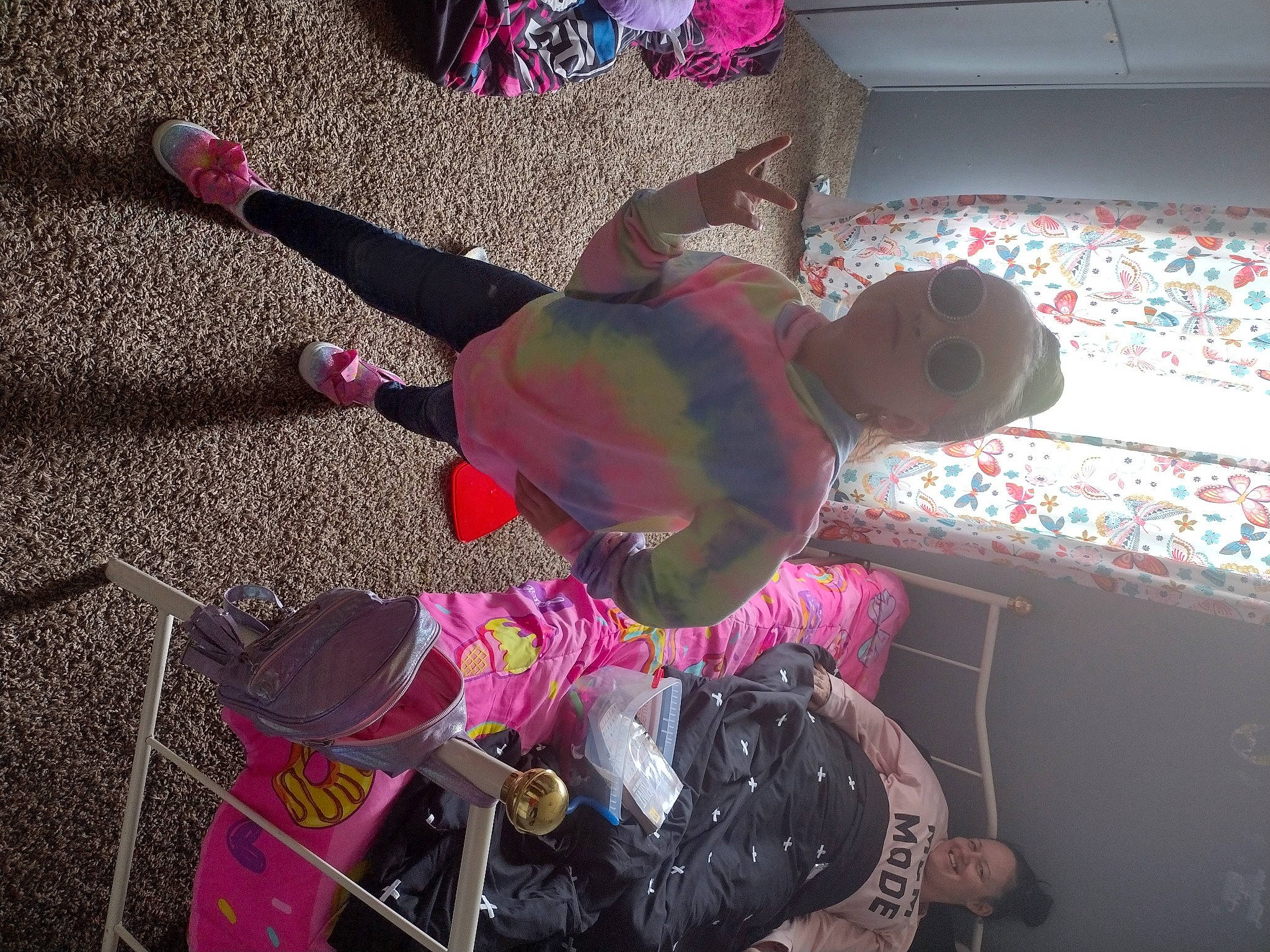 Christianna joined the competition — help win amazing prizes! black, carmine, child, event, flooring, fun, joy, leisure, luggage_and_bags, magenta, person, pink, plastic, play, purple, red, room, sandal, shoe, sneakers