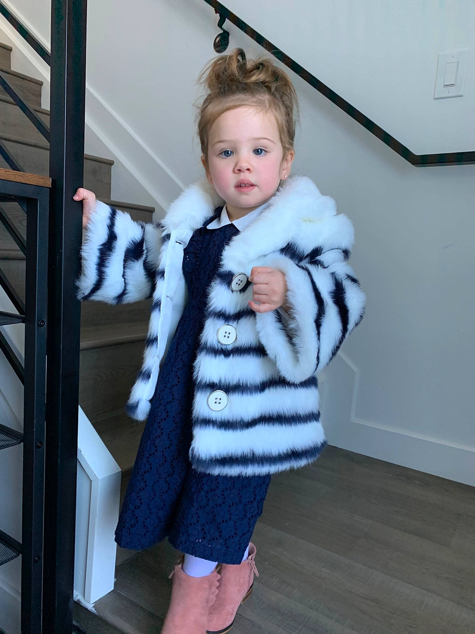 Kairi is registered to the contest to win money with this photo: child, clothing, coat, fur, fur_clothing, hood, jacket, natural_material, outerwear, person, skin, sleeve, textile, toddler, winter, wool