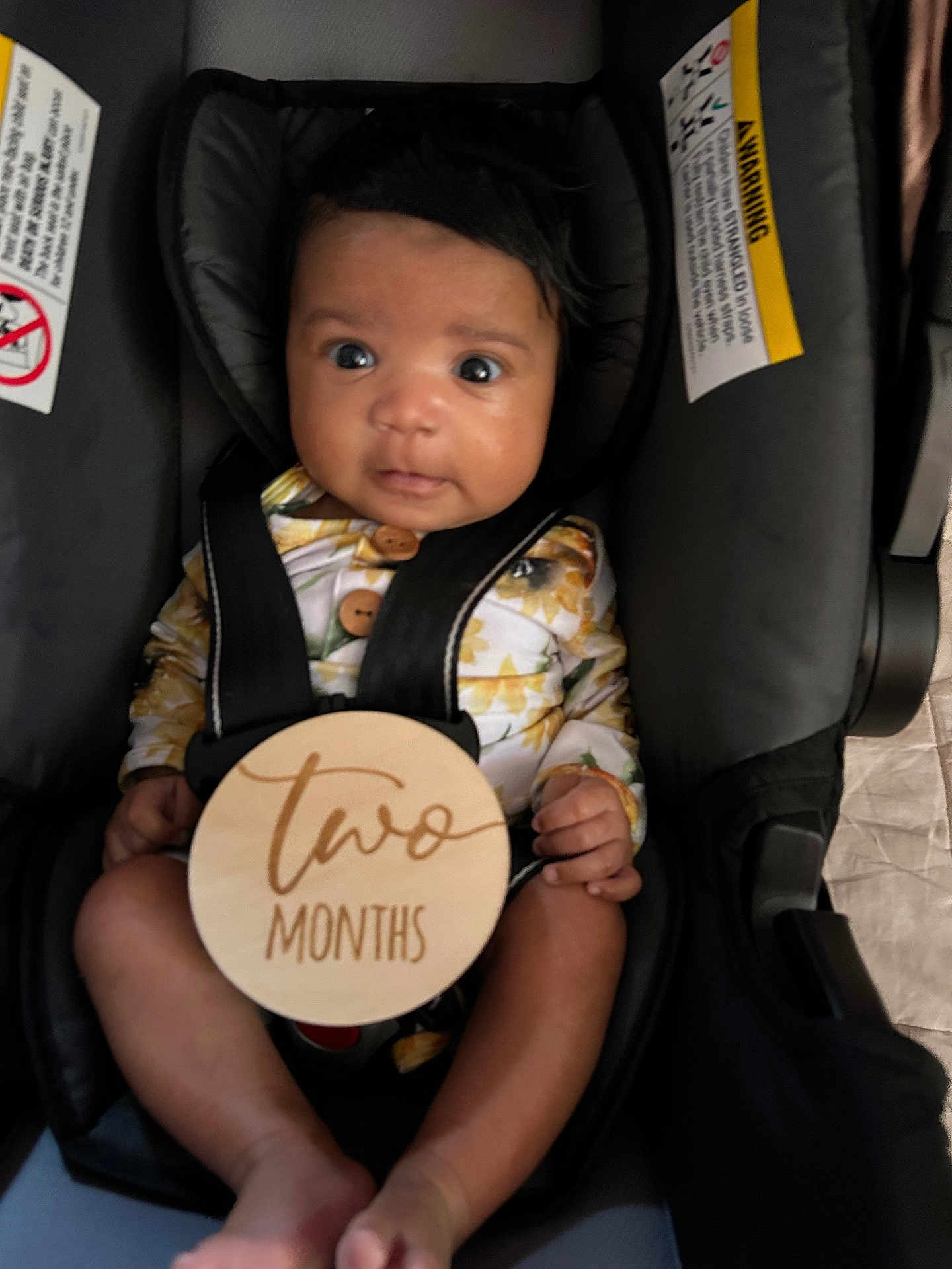 Saniya joined the competition — help win amazing prizes! baby, bodypart, car, car_interior, carseat, clothing, cushion, dress, face, finger, hand, head, homedecor, lifejacket, person, photography, portrait, transportation, vehicle, vest