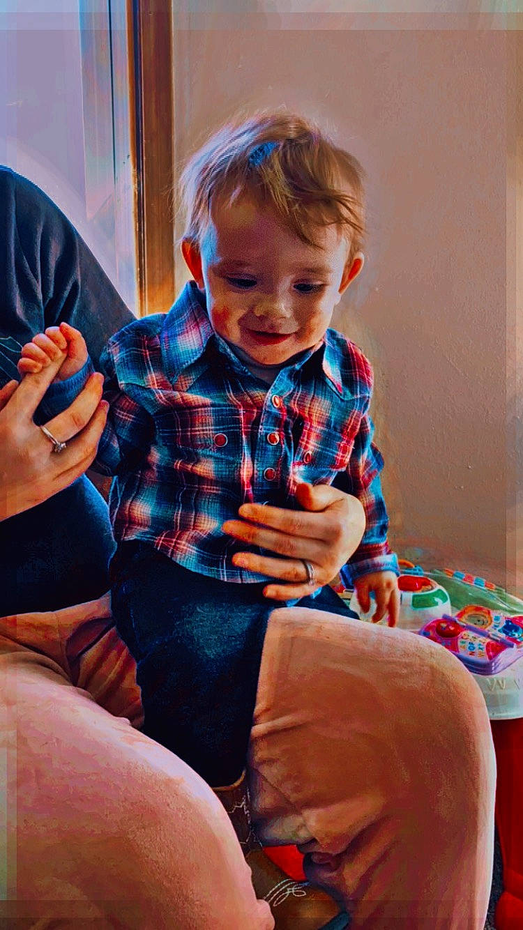 Clark joined the competition — help win amazing prizes! arm, baby_toddler_clothing, comfort, electric_blue, fun, hand, happy, head, human, jeans, knee, lap, person, skin, smile, sock, standing, t_shirt, tartan, thigh