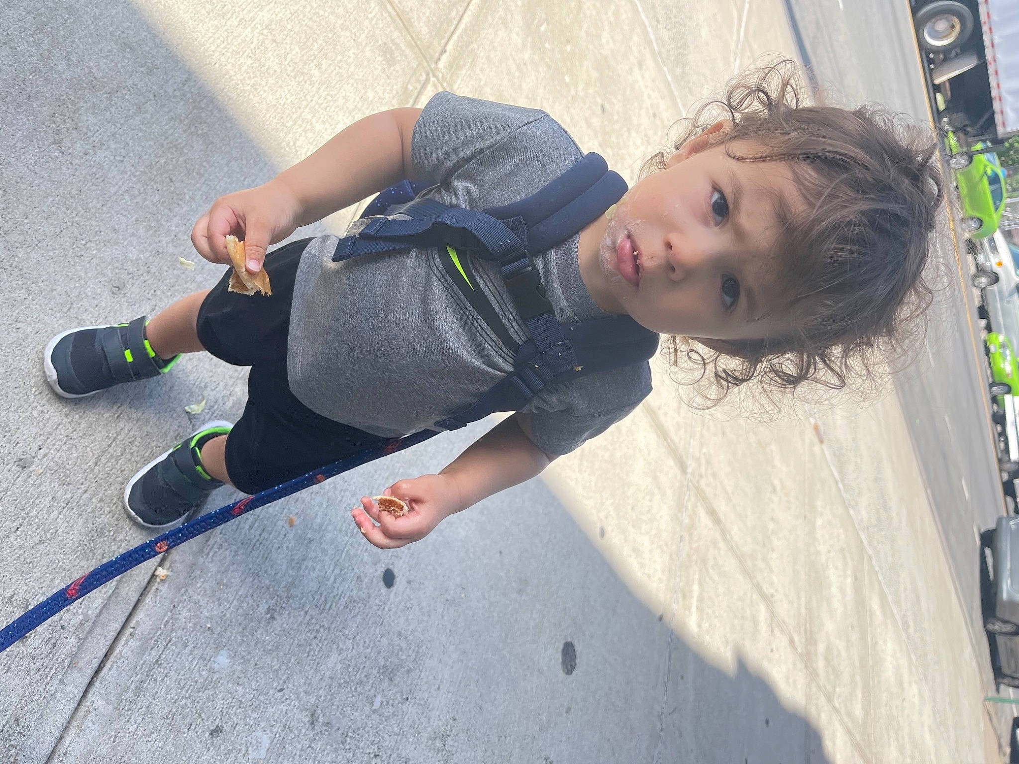 Xadrian is registered to the contest to win money with this photo: asphalt, child, city, concrete, cool, electric_blue, flooring, foot, fun, grass, human_leg, joint, knee, leisure, person, road_surface, sidewalk, street_fashion, thigh, toddler