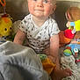 Albie-Paul joined the competition — help win amazing prizes! baby, child, toys, stuffed_animals, blanket, smile, blue_eyes, onesie, sitting, indoors, soft_toys, cute, infant, playtime, colorful, happy, person, face, foot, cozy