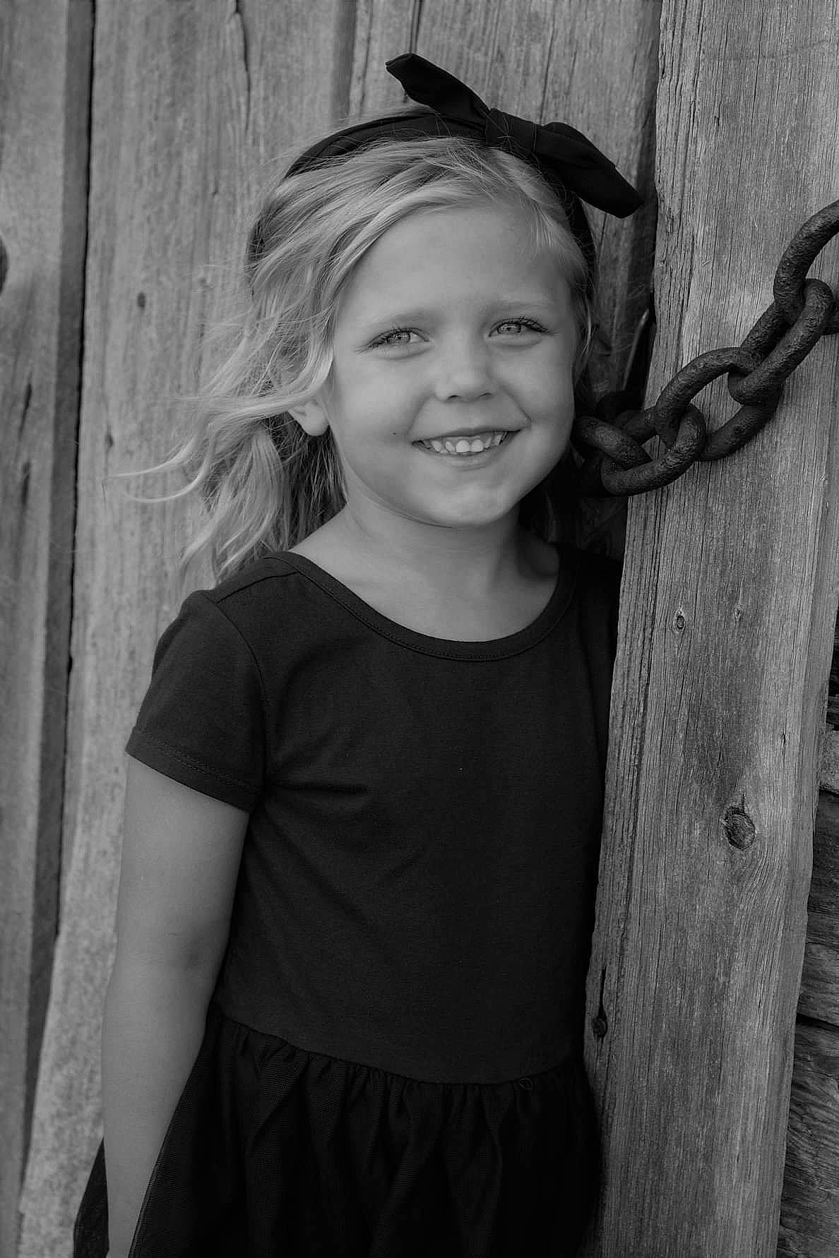 Sky joined the competition — help win amazing prizes! black, black_and_white, child, child_model, eye, joy, long_hair, monochrome, monochrome_photography, person, photography, portrait, smile, standing