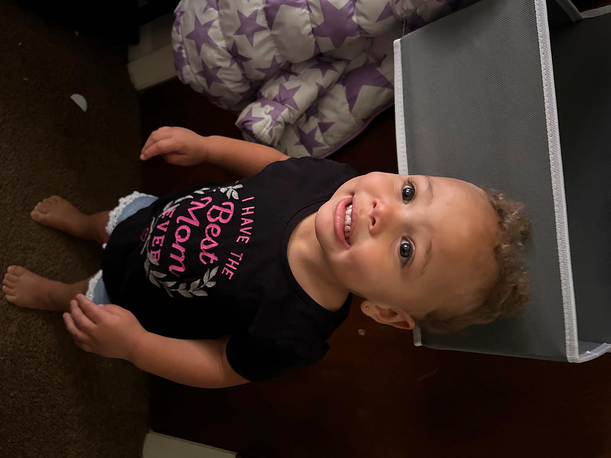 Brooklyn joined the competition — help win amazing prizes! baby, child, chin, comfort, elbow, face, flash_photography, flooring, fun, happy, human_leg, knee, mouth, person, room, sitting, sleeve, smile, t_shirt, thigh