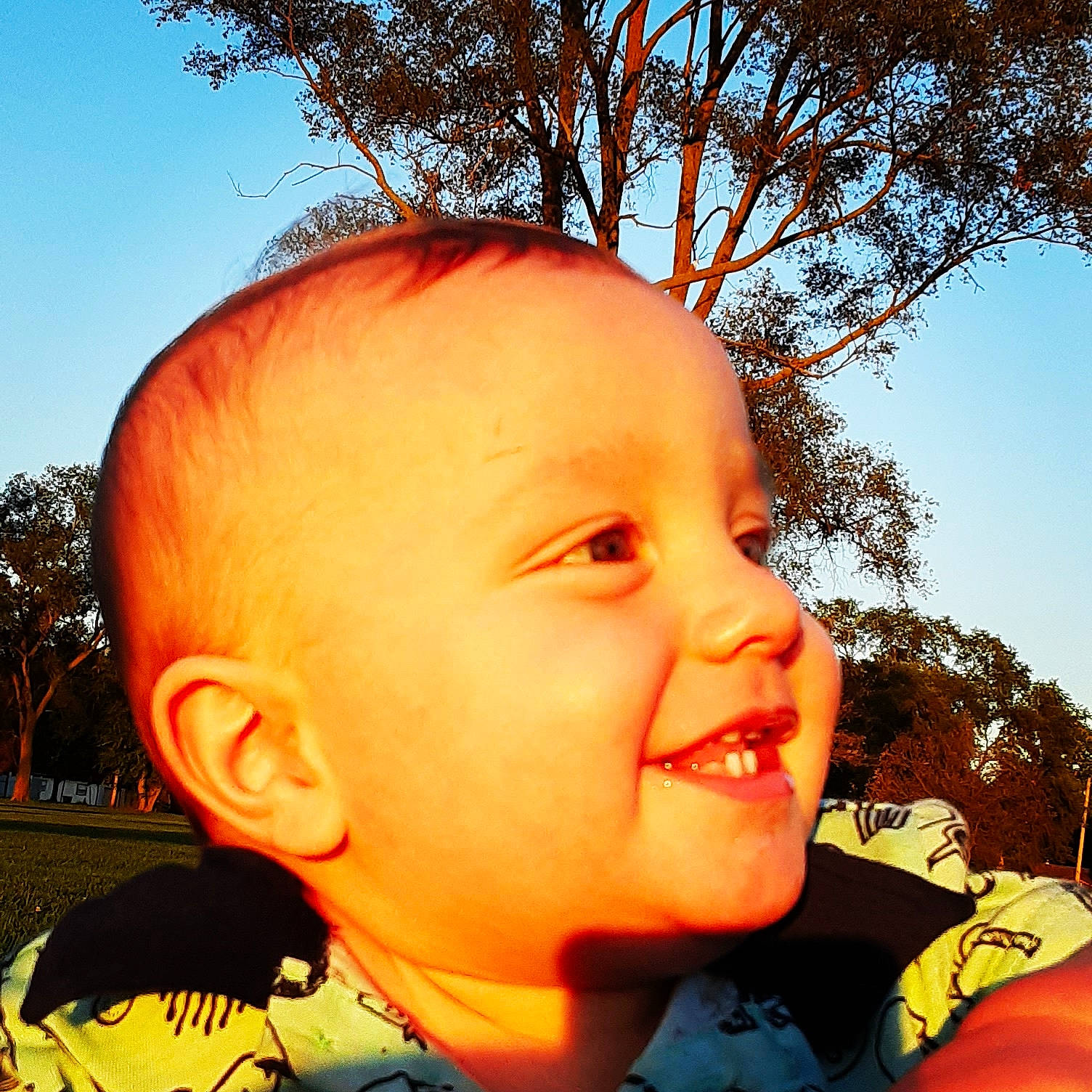 Emory is registered to the contest to win money with this photo: baby, cheek, child, chin, cool, eye, face, facial_expression, forehead, hair, hairstyle, happy, head, joy, lip, mouth, nose, person, skin, sky