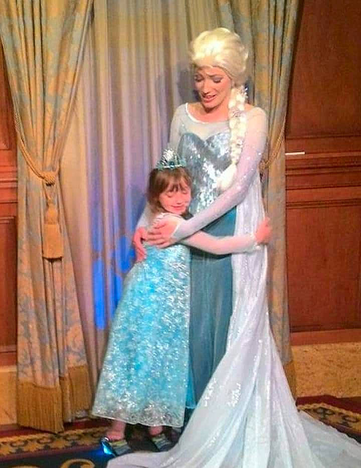 Kaylinn is registered to the contest to win money with this photo: a_line, bridal_accessory, bridal_clothing, bridal_party_dress, bride, ceremony, clothing, dress, event, fashion, fashion_design, formal_wear, gown, haute_couture, headwear, joy, person, shoulder, textile, tradition